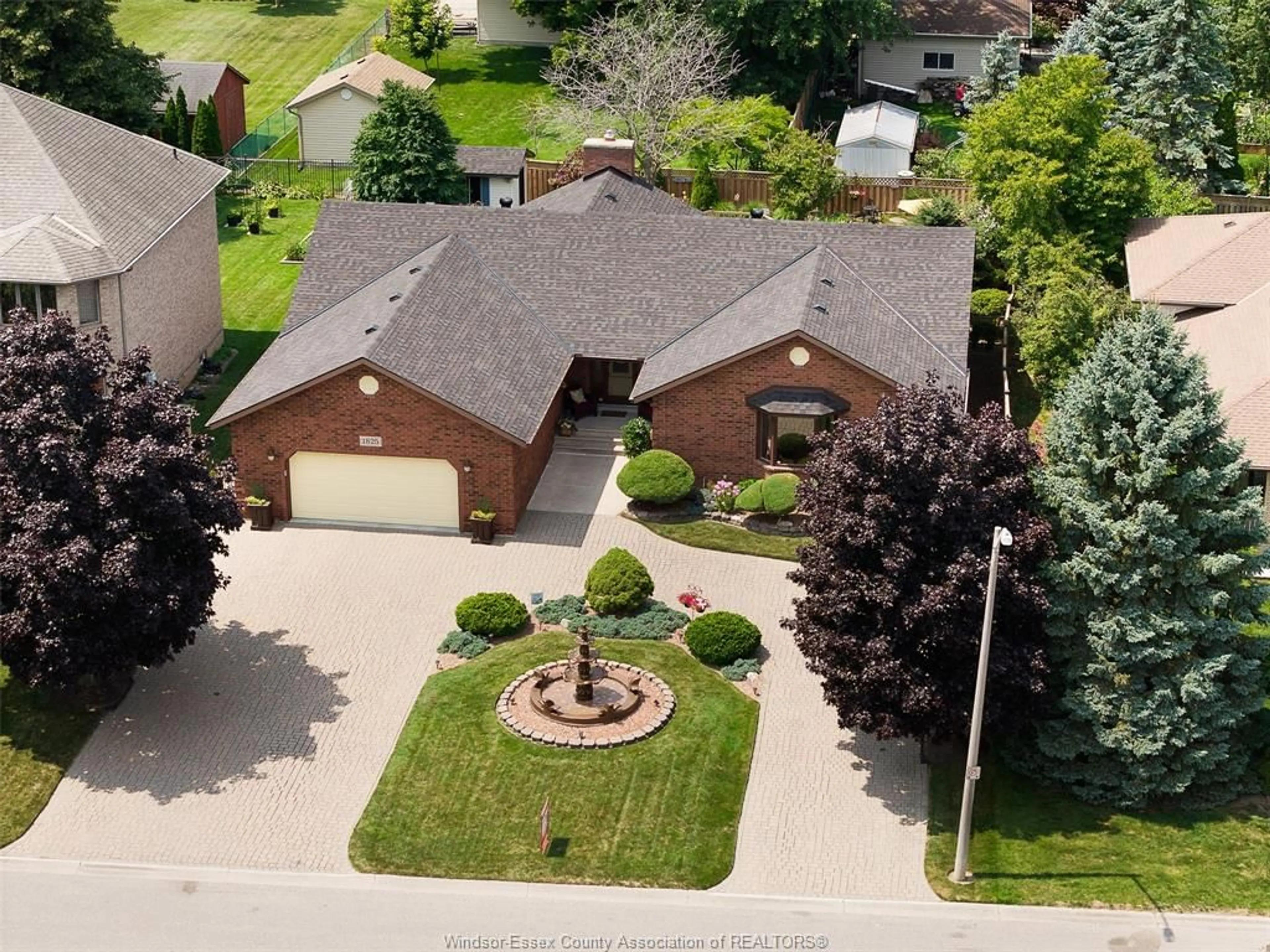 A pic from outside/outdoor area/front of a property/back of a property/a pic from drone, street for 1825 HEBERT St, Tecumseh Ontario N8N 4G4