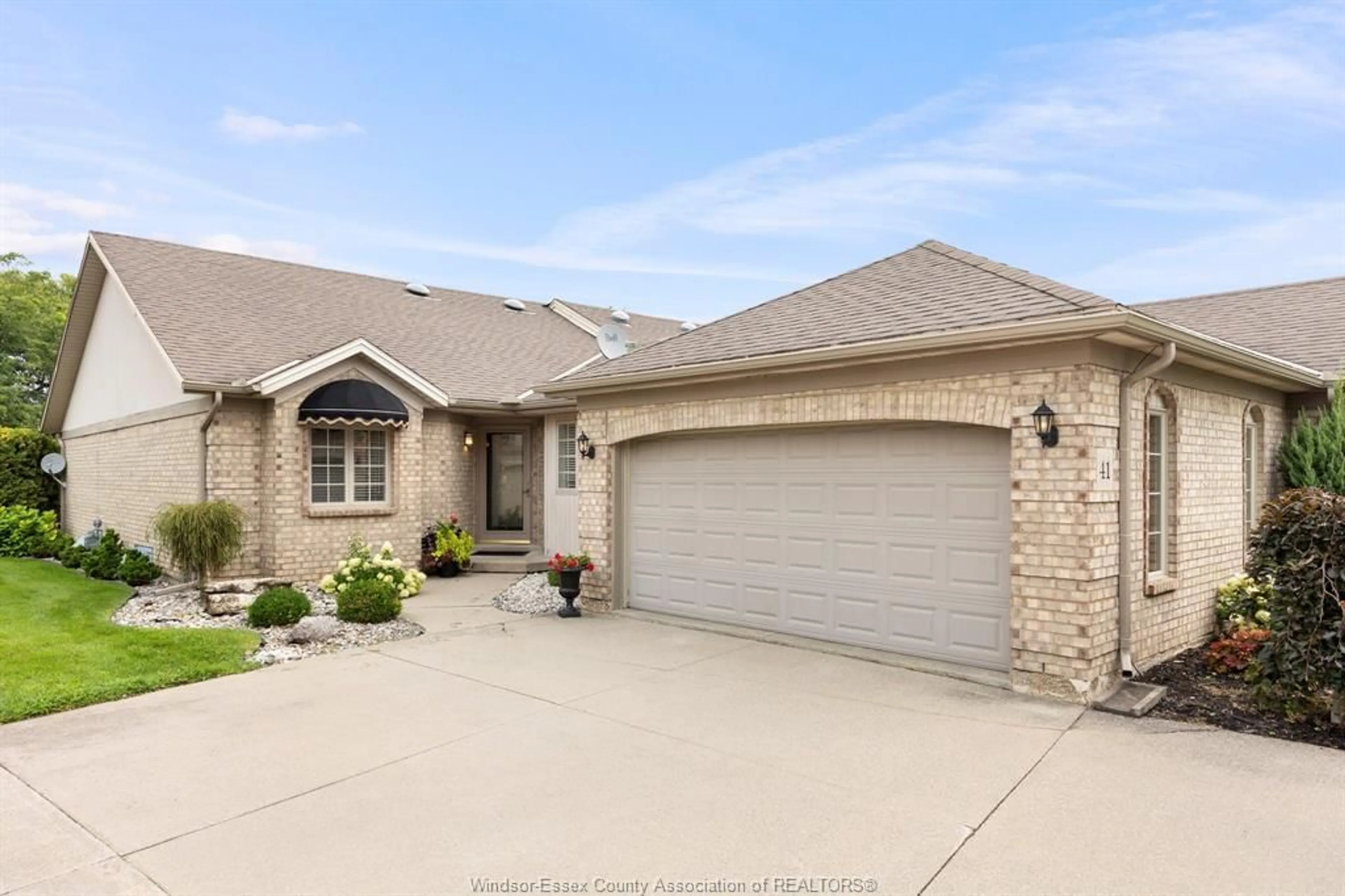 Home with brick exterior material, street for 41 Cherokee Lane, Leamington Ontario N8H 5G5
