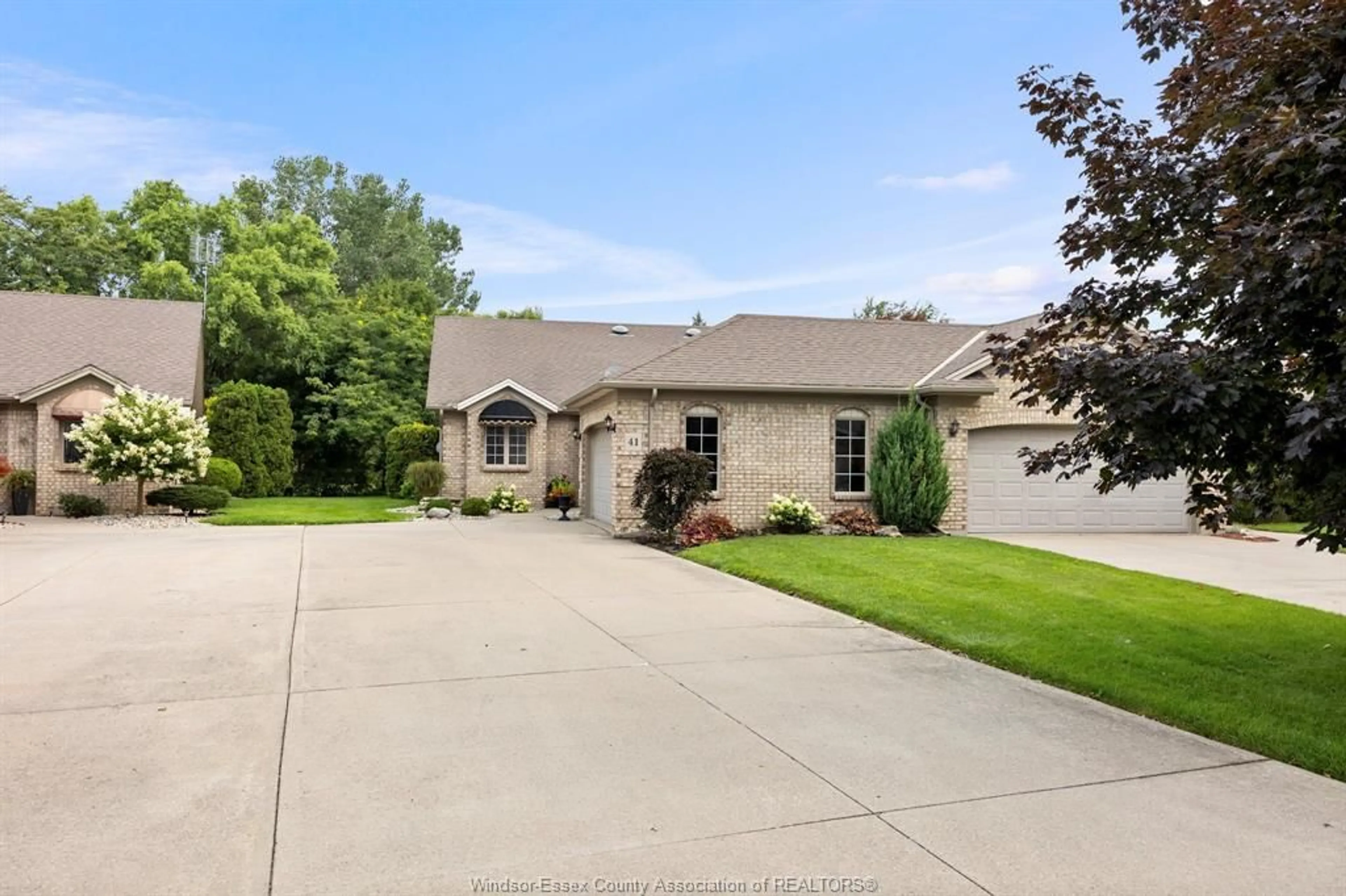 A pic from outside/outdoor area/front of a property/back of a property/a pic from drone, street for 41 Cherokee Lane, Leamington Ontario N8H 5G5