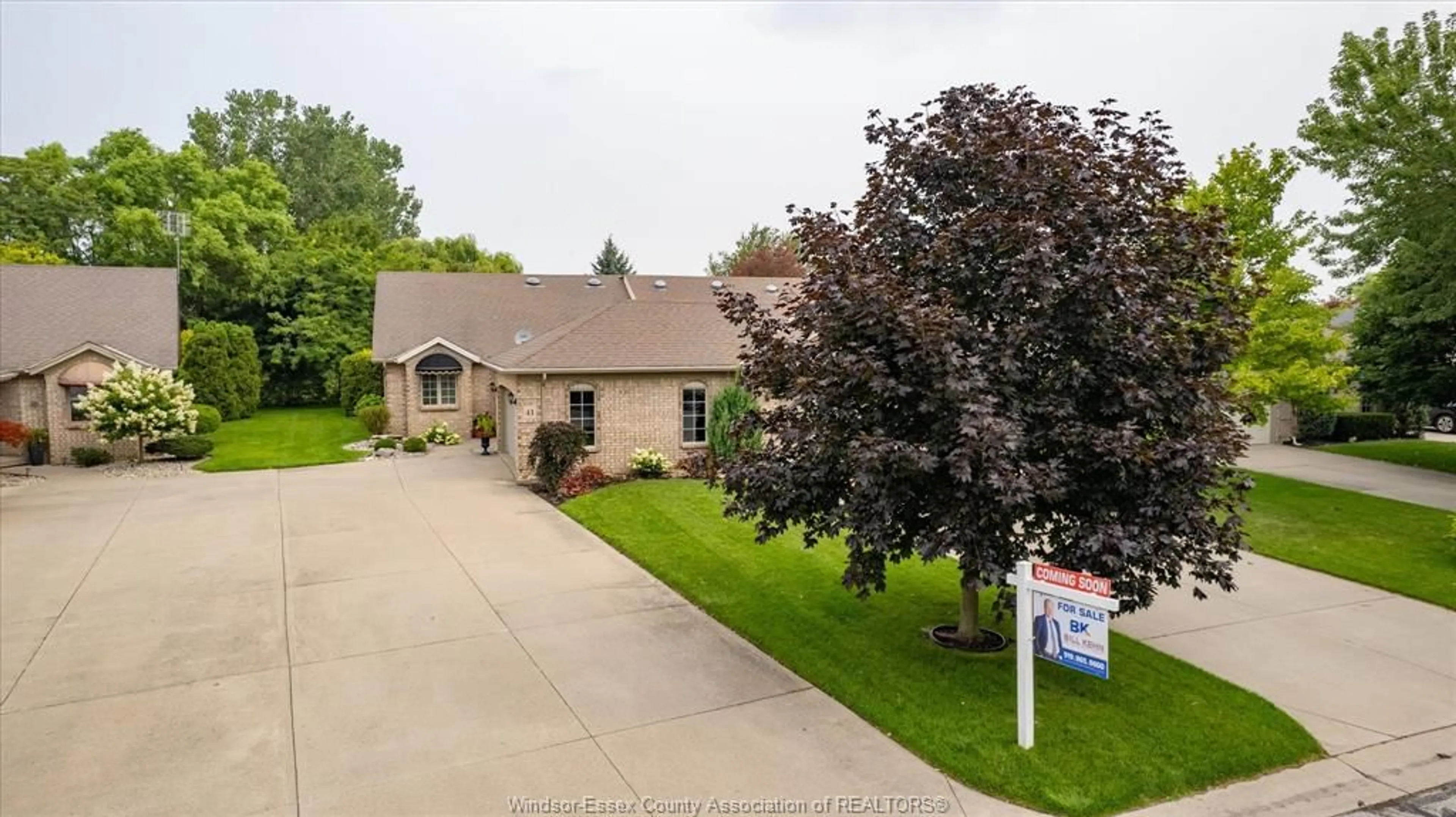 A pic from outside/outdoor area/front of a property/back of a property/a pic from drone, street for 41 Cherokee Lane, Leamington Ontario N8H 5G5