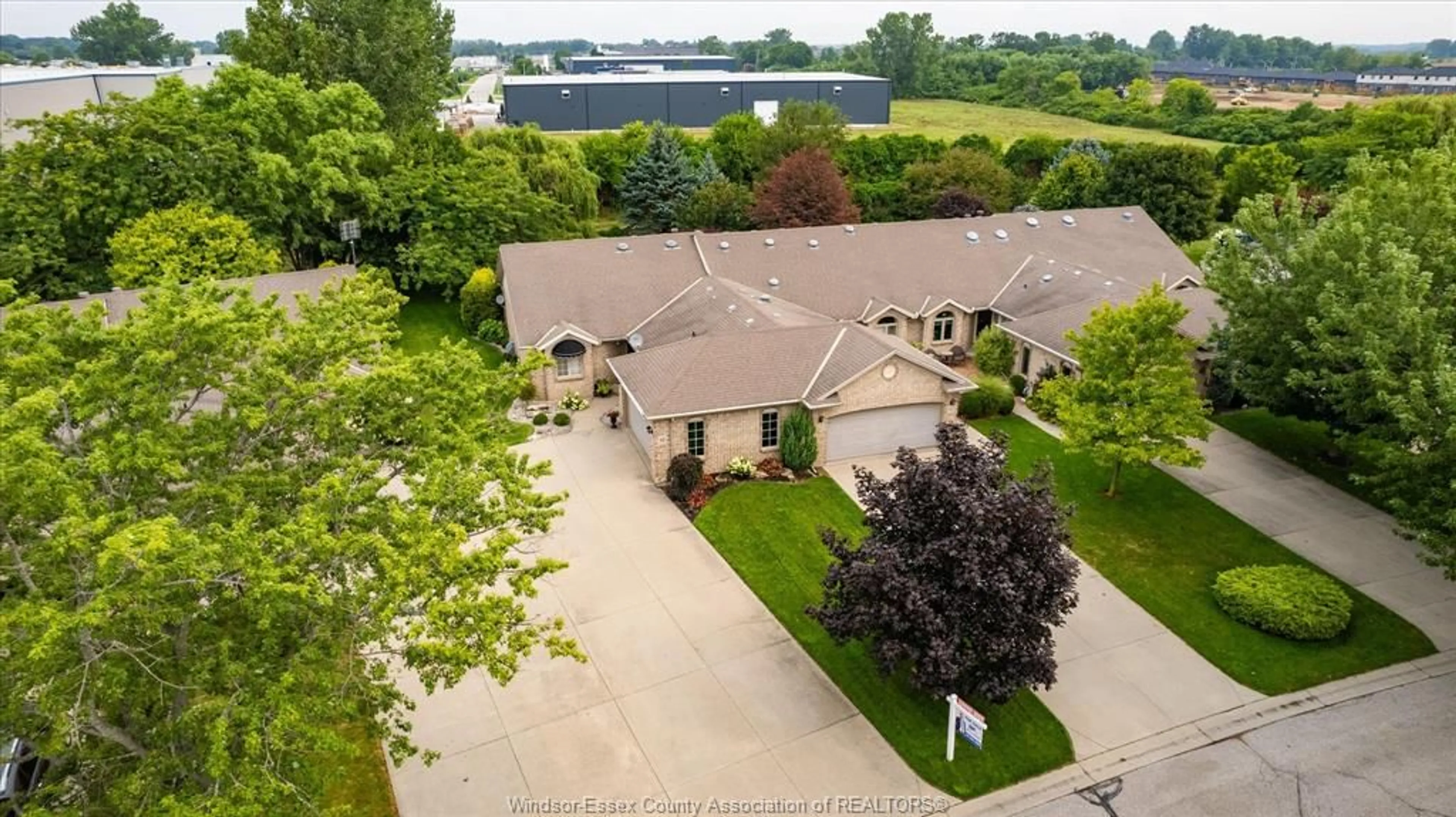 A pic from outside/outdoor area/front of a property/back of a property/a pic from drone, water/lake/river/ocean view for 41 Cherokee Lane, Leamington Ontario N8H 5G5