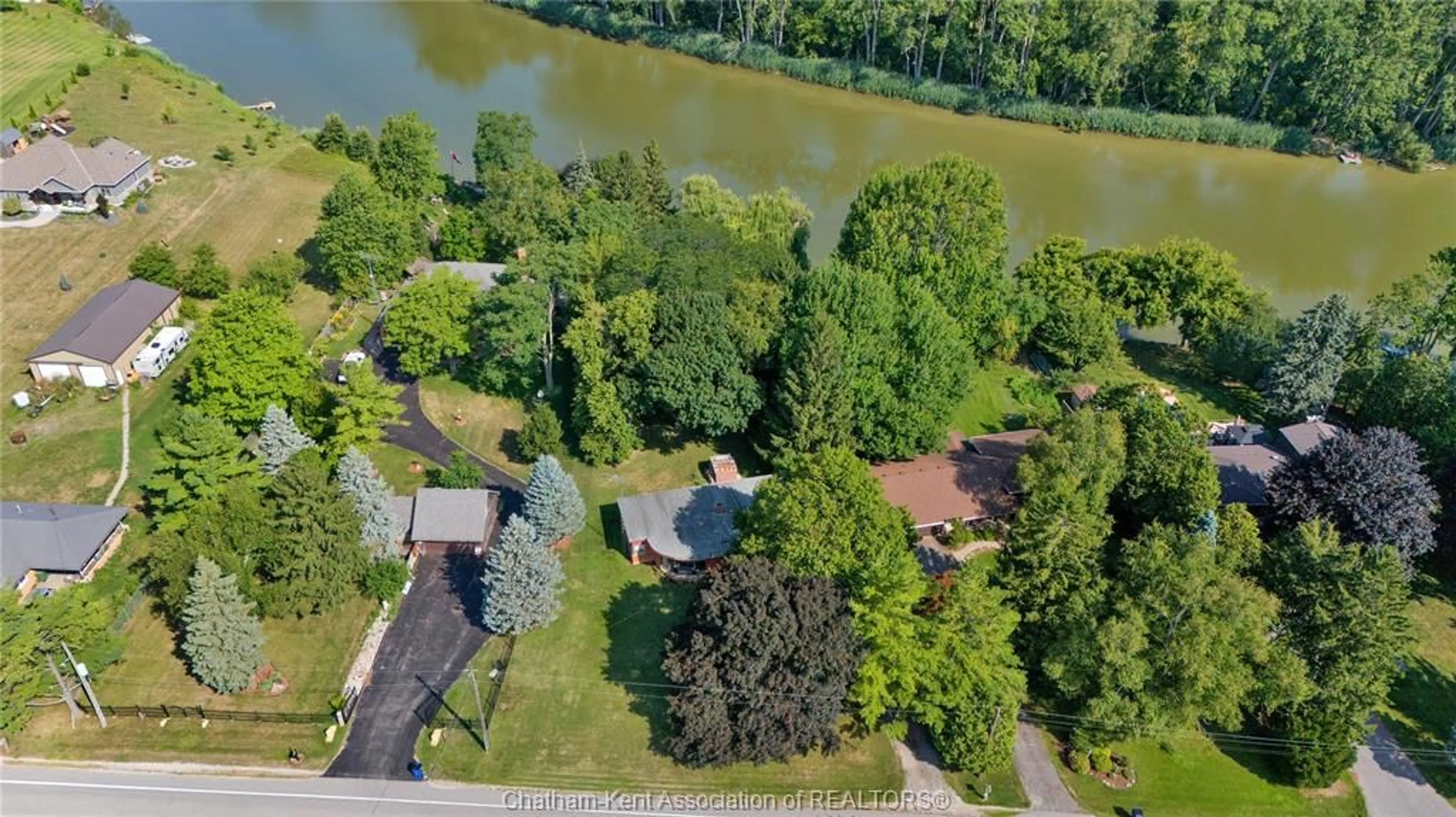 A pic from outside/outdoor area/front of a property/back of a property/a pic from drone, water/lake/river/ocean view for 6959 Riverview Line, Raleigh Township Ontario N7M 5T1