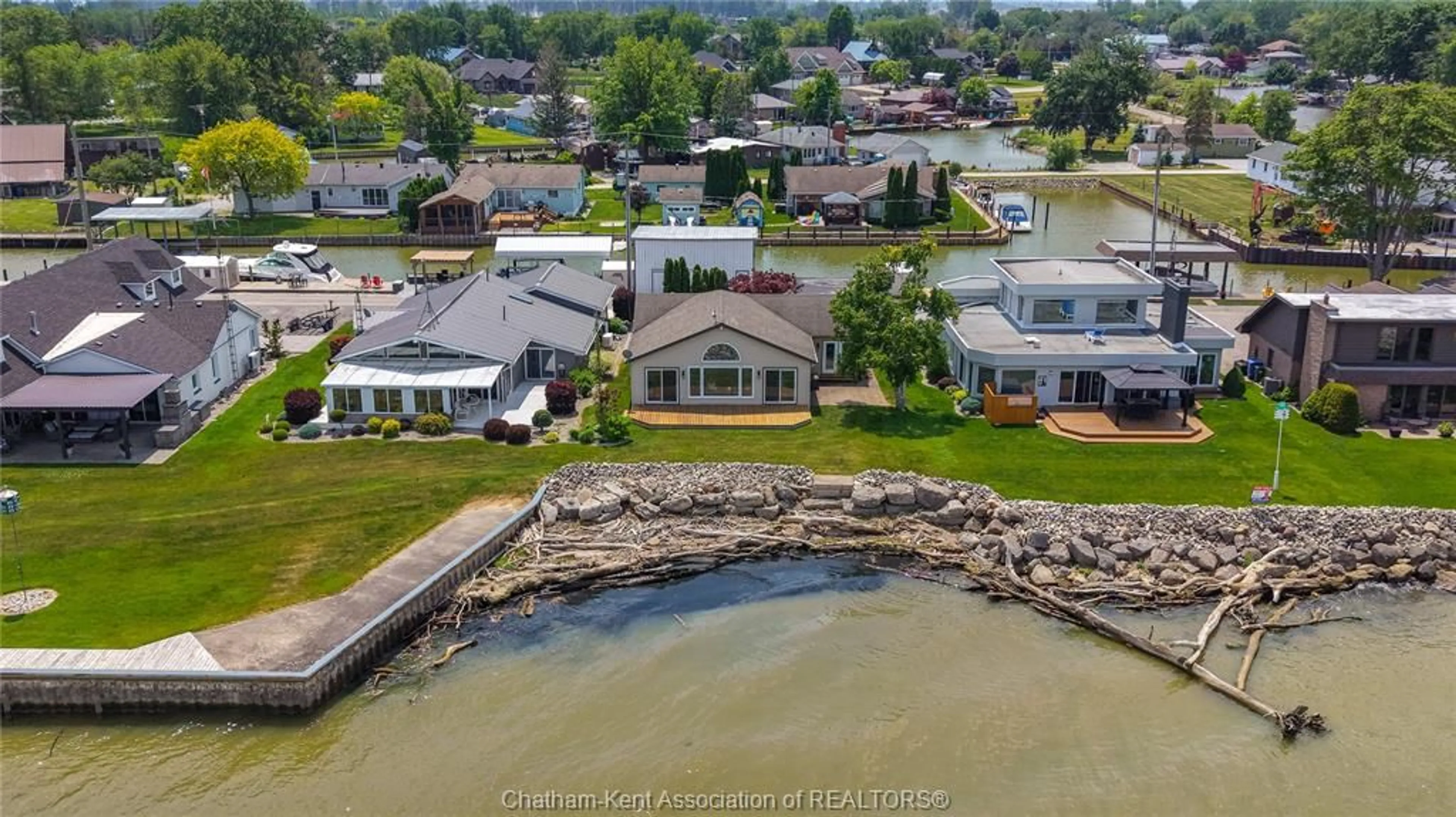 A pic from outside/outdoor area/front of a property/back of a property/a pic from drone, water/lake/river/ocean view for 19060 PENINSULA St, Lighthouse Cove Ontario N0P 2L0