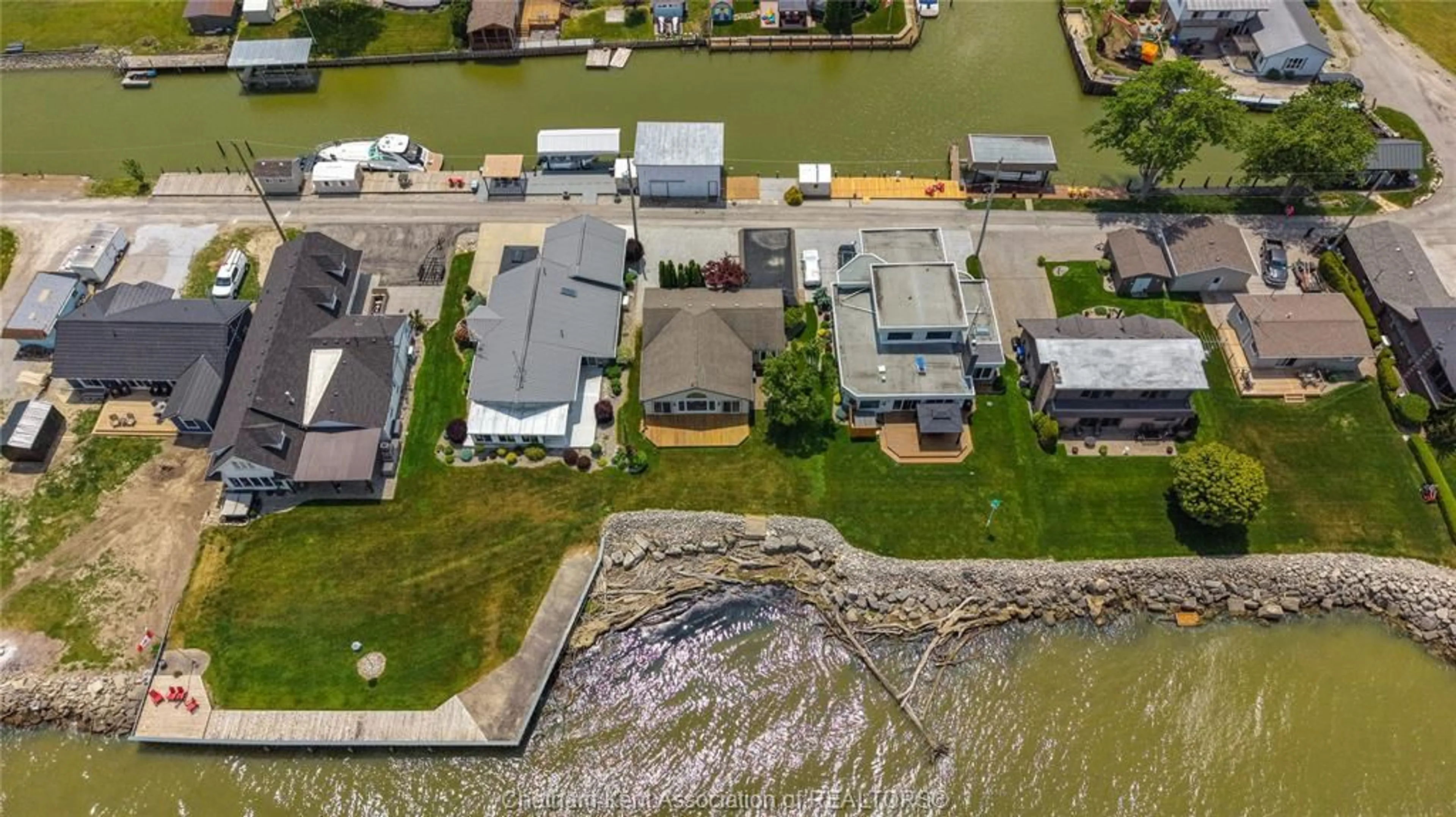 A pic from outside/outdoor area/front of a property/back of a property/a pic from drone, water/lake/river/ocean view for 19060 PENINSULA St, Lighthouse Cove Ontario N0P 2L0
