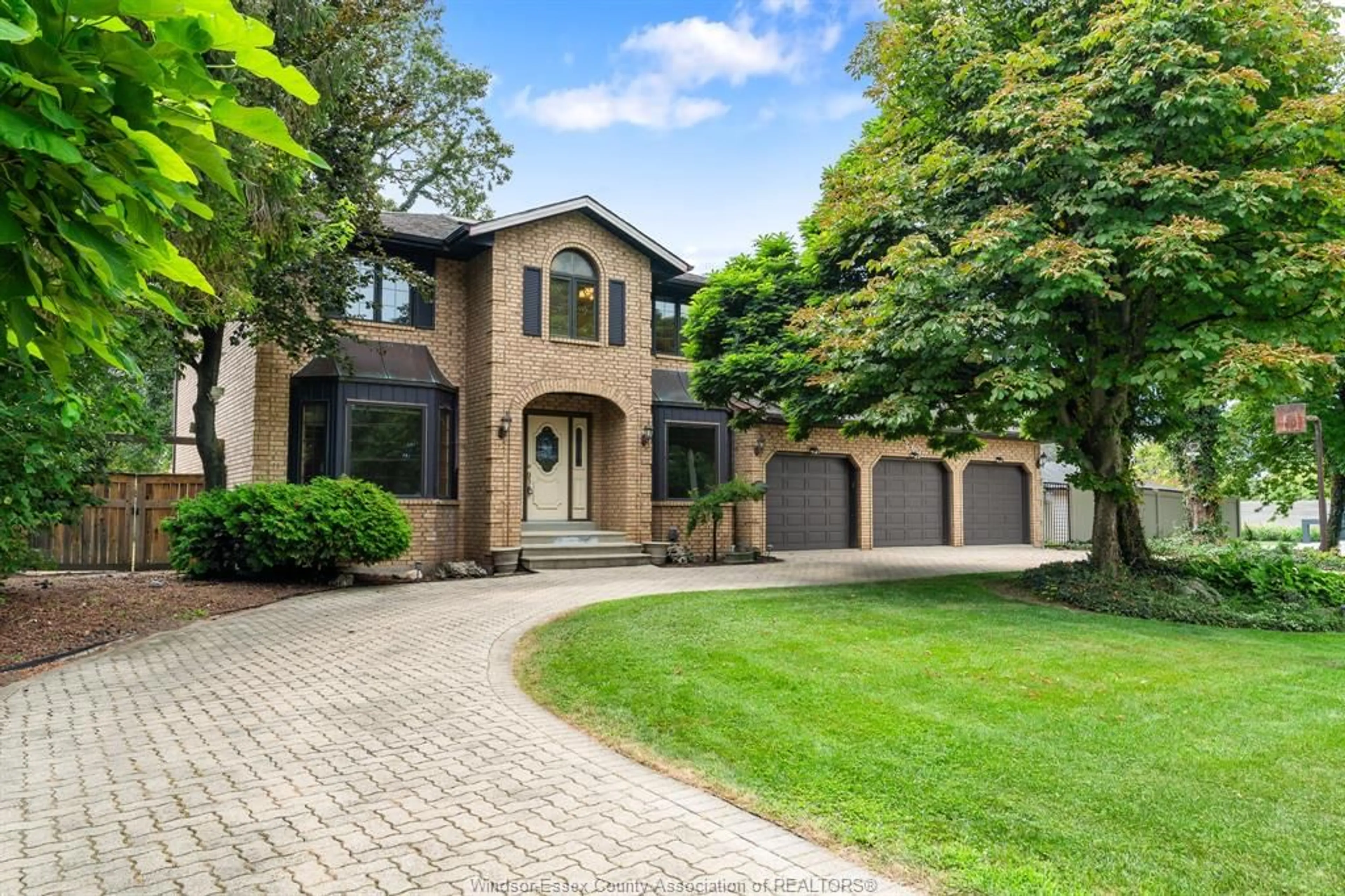 Home with brick exterior material, street for 267 ELMGROVE Dr, Lakeshore Ontario N8N 4G9