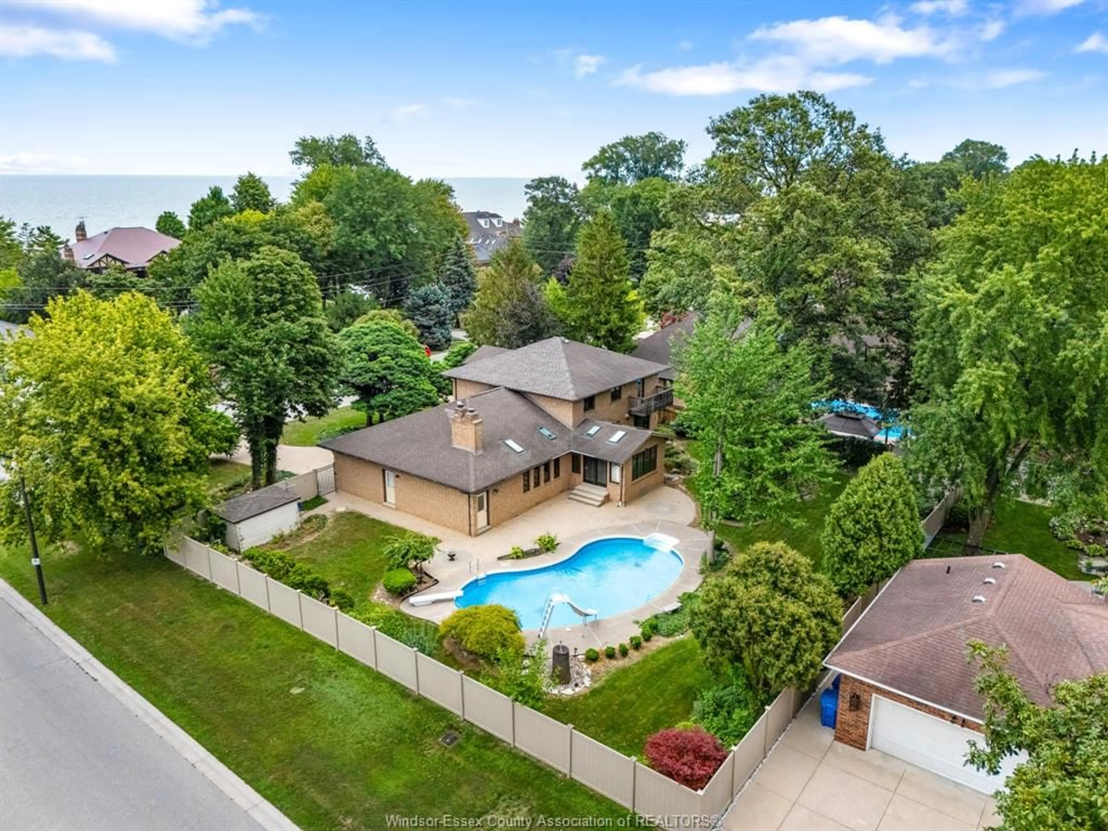 A pic from outside/outdoor area/front of a property/back of a property/a pic from drone, water/lake/river/ocean view for 267 ELMGROVE Dr, Lakeshore Ontario N8N 4G9