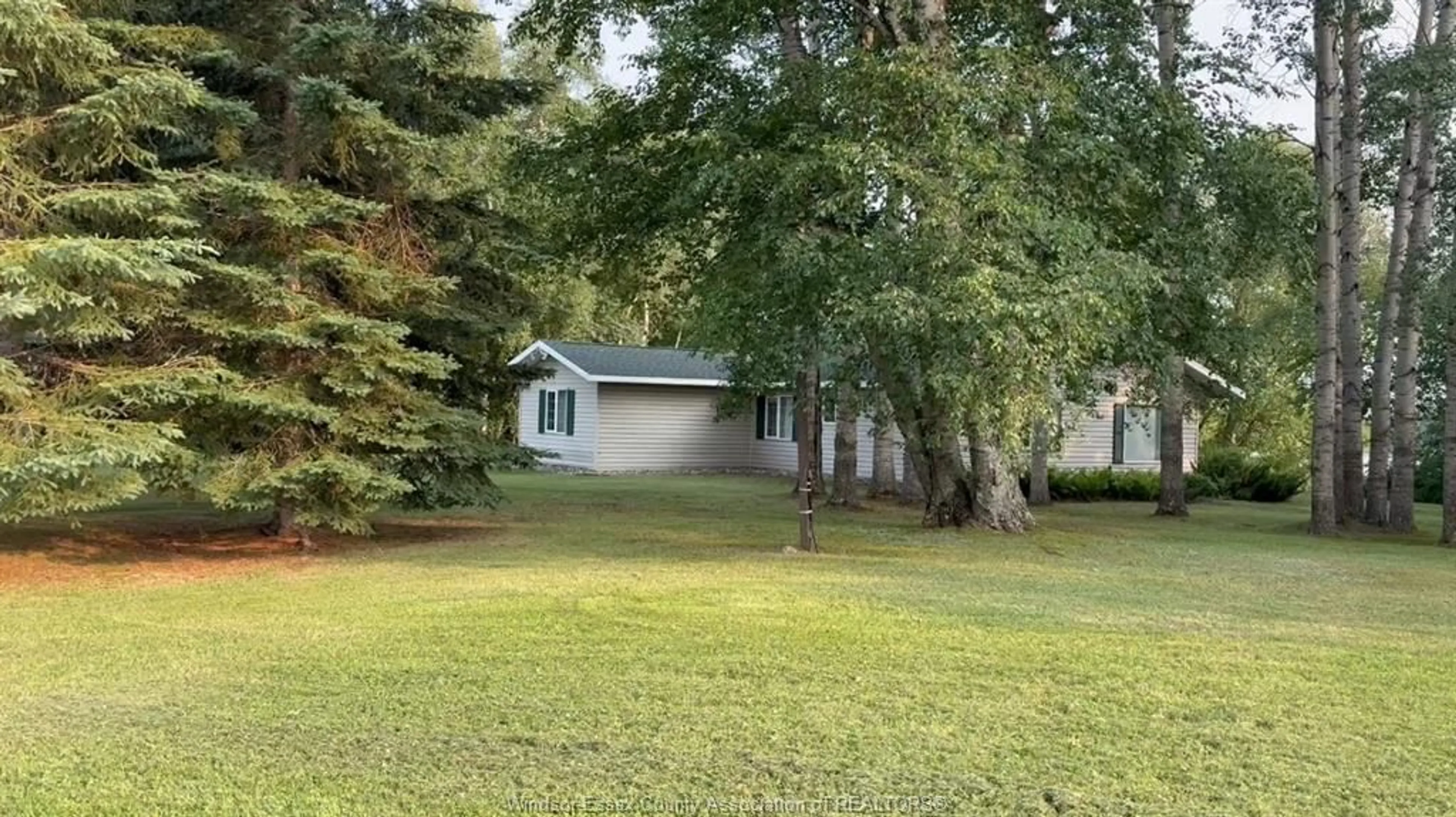 A pic from outside/outdoor area/front of a property/back of a property/a pic from drone, unknown for 188 BYRNES Rd, Rainy River Ontario P0W 1L0