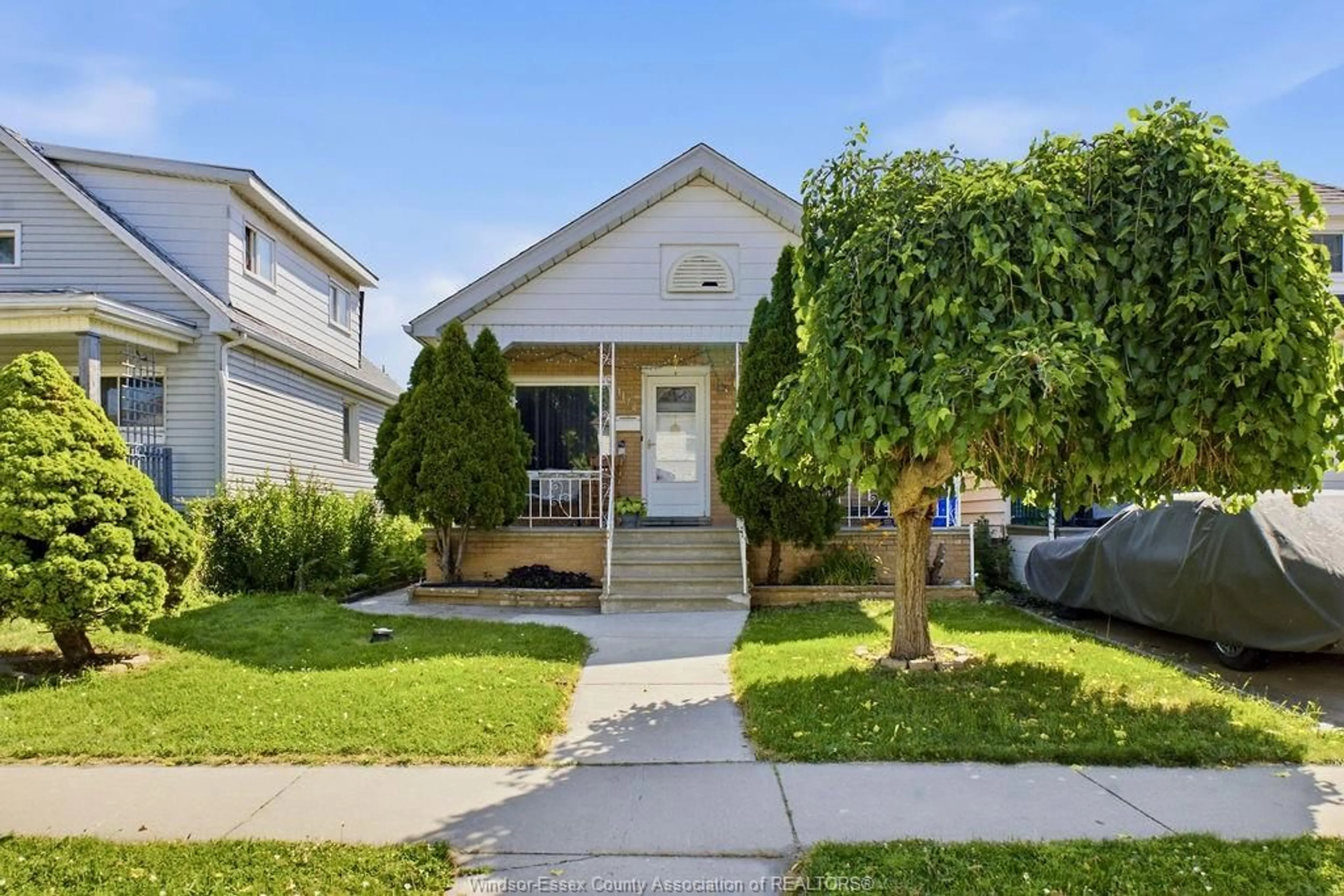 Home with vinyl exterior material, street for 1172 MARION Ave, Windsor Ontario N9A 2J4