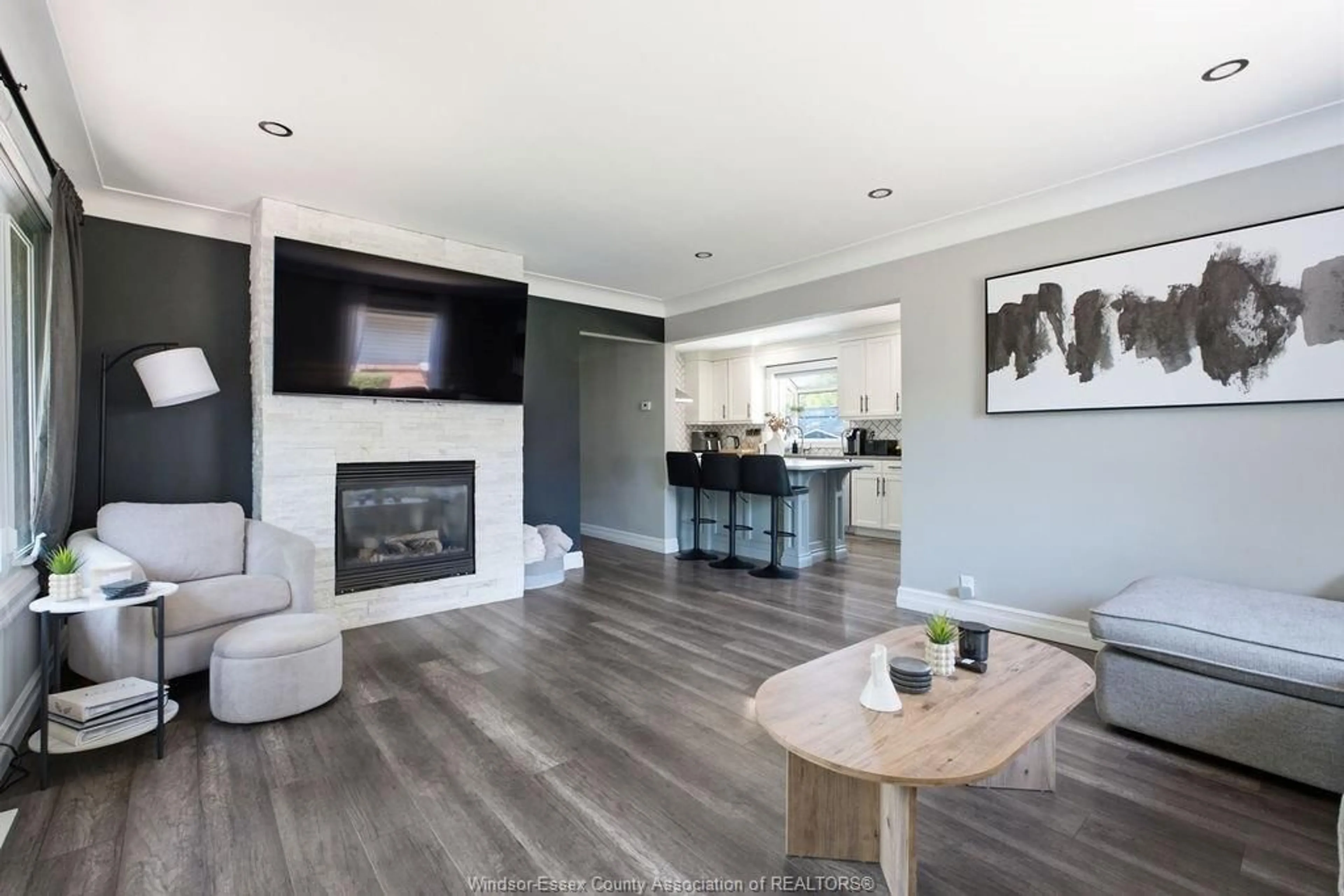 Living room with furniture, wood/laminate floor for 251 ST. MARKS Rd, Tecumseh Ontario N8N 2H6