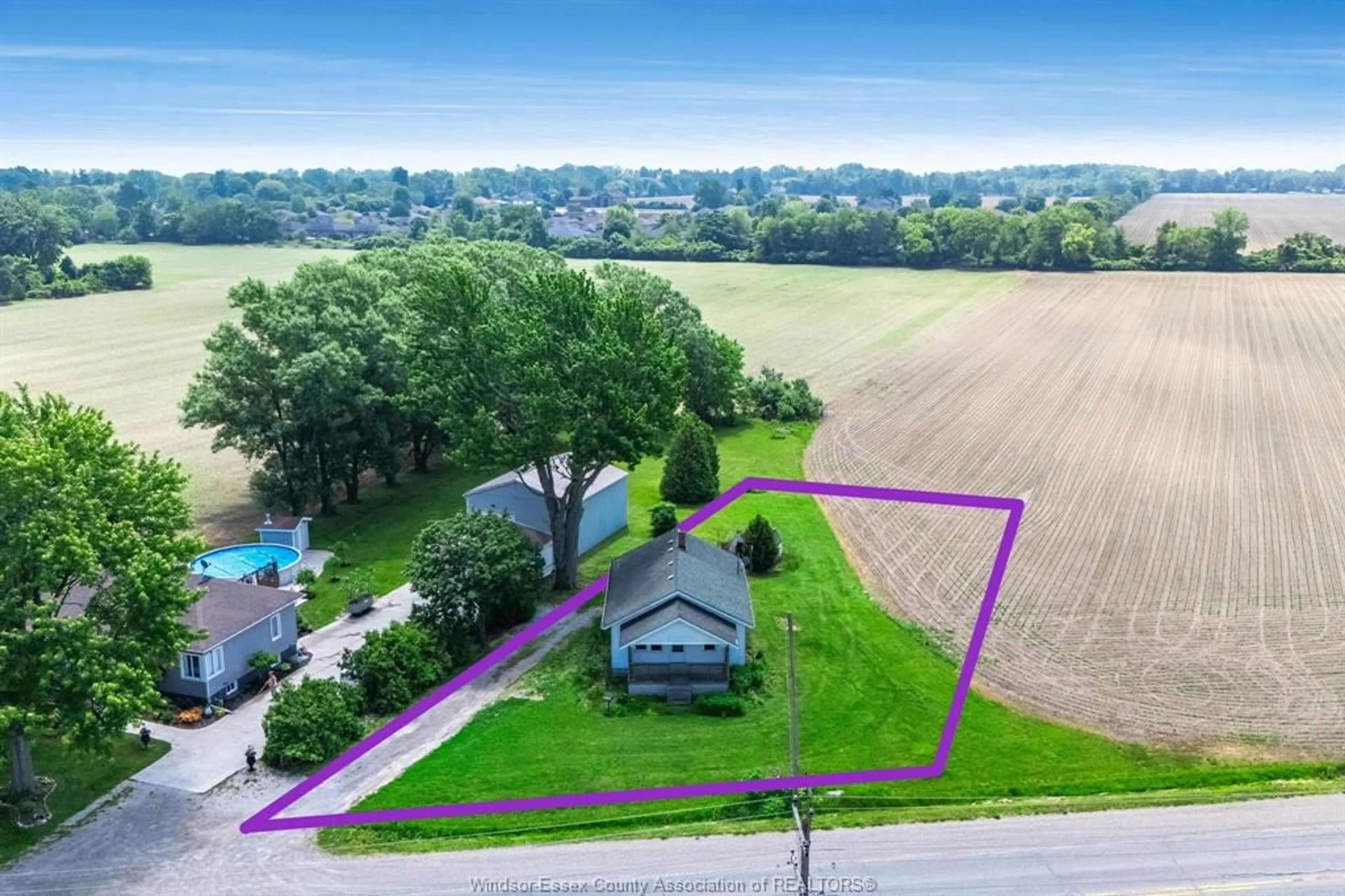 A pic from outside/outdoor area/front of a property/back of a property/a pic from drone, water/lake/river/ocean view for 389 County Road 20, Kingsville Ontario N9Y 2K3