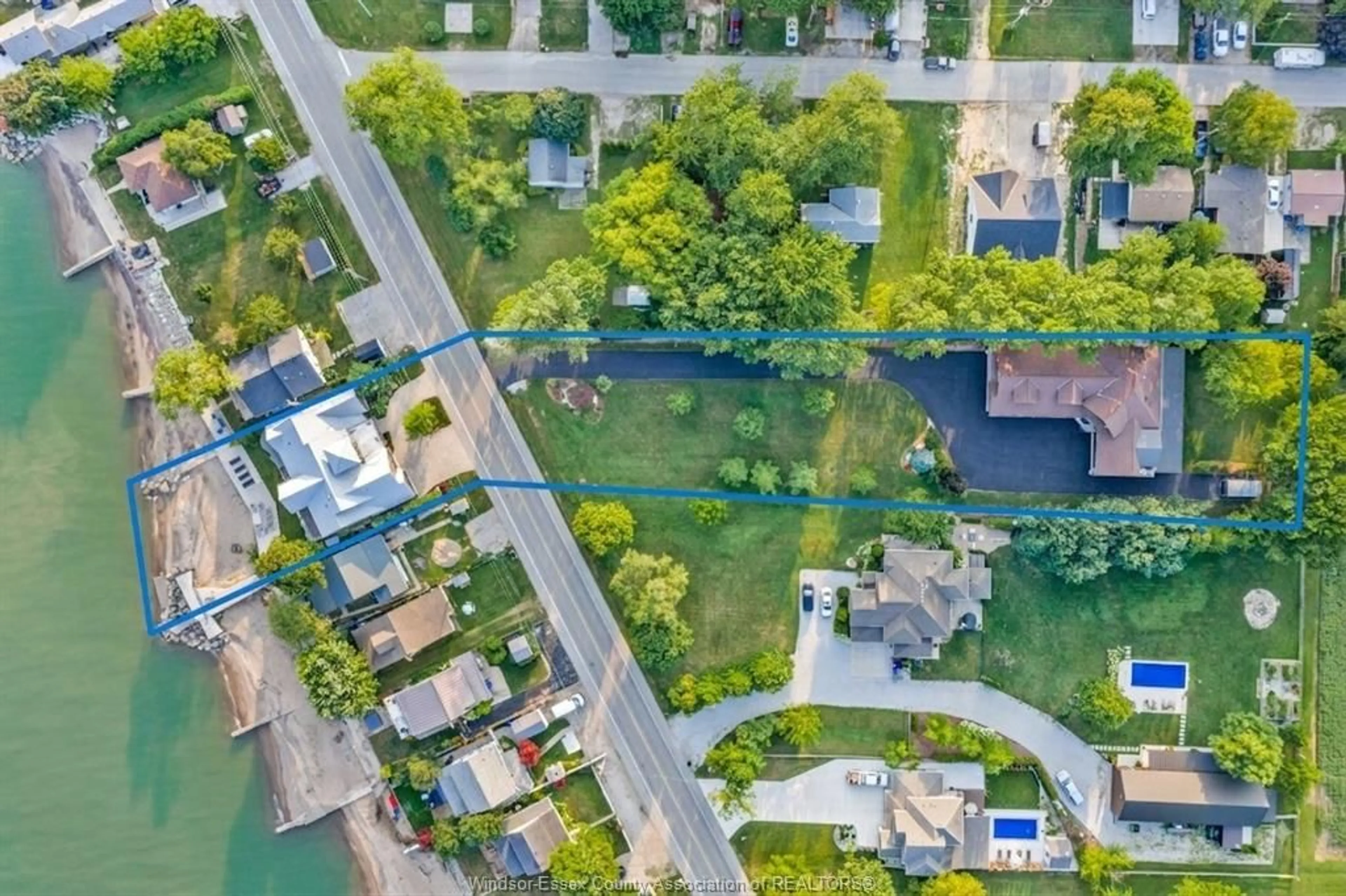 A pic from outside/outdoor area/front of a property/back of a property/a pic from drone, water/lake/river/ocean view for 1501 HERITAGE Rd, Kingsville Ontario N9Y 2E6