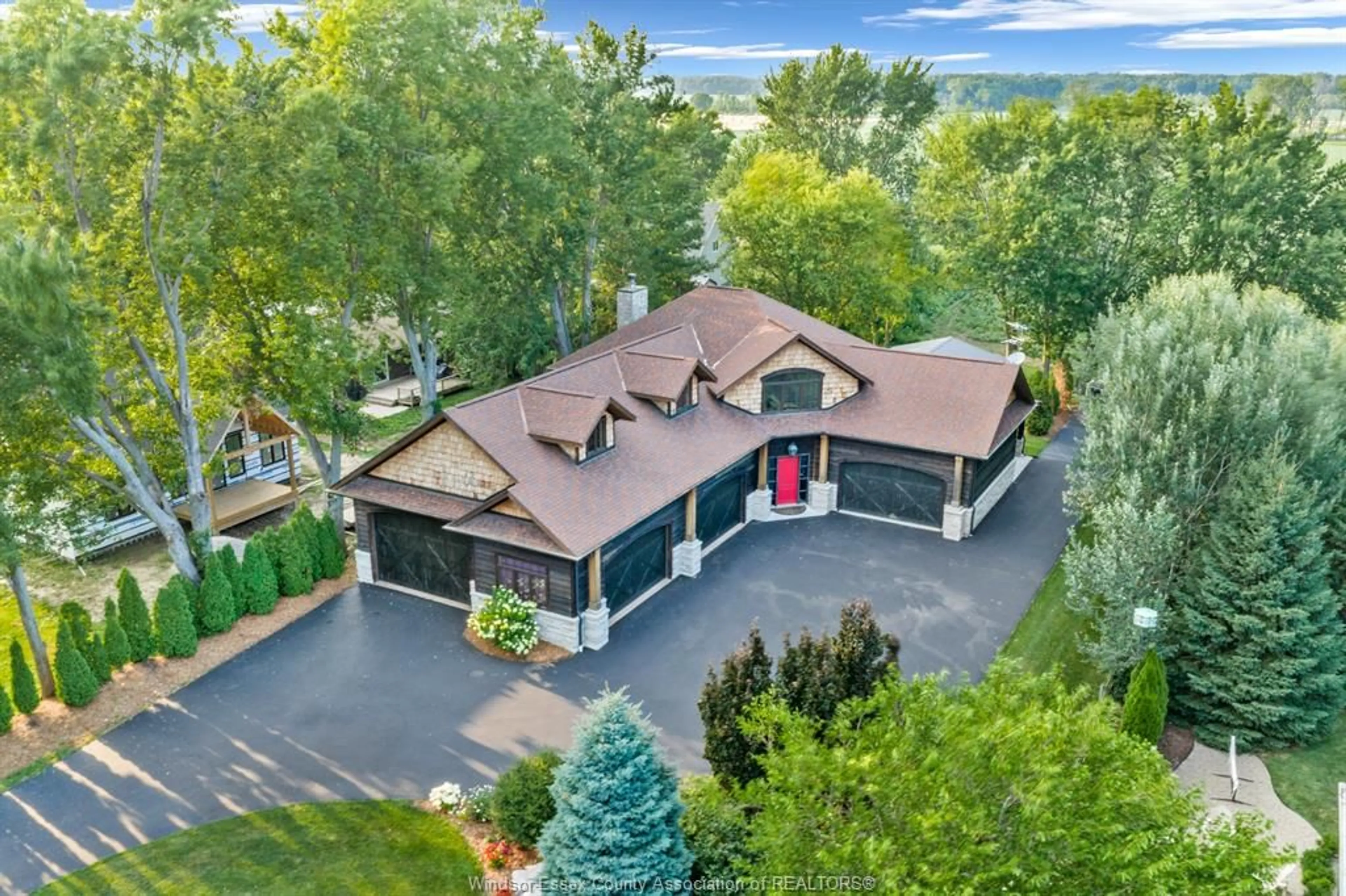 A pic from outside/outdoor area/front of a property/back of a property/a pic from drone, water/lake/river/ocean view for 1501 HERITAGE Rd, Kingsville Ontario N9Y 2E6