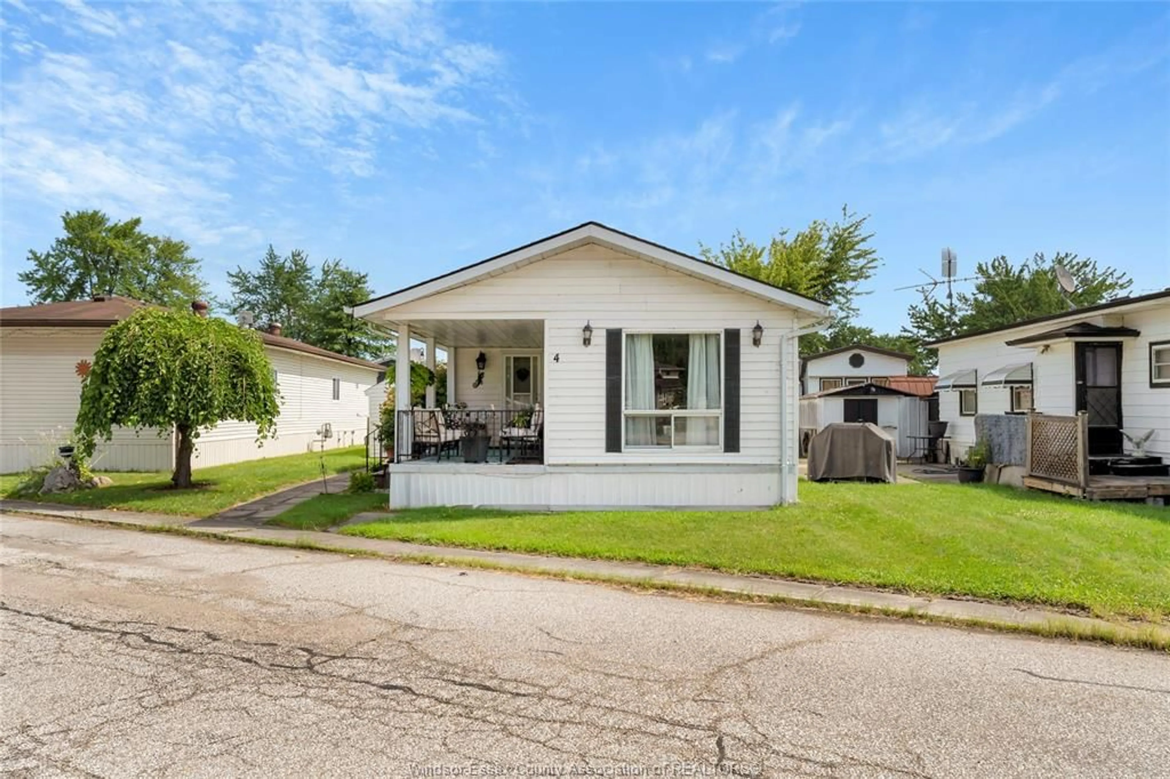 Home with vinyl exterior material, street for 4 ROBIN Crt, Lakeshore Ontario N8N 2V9