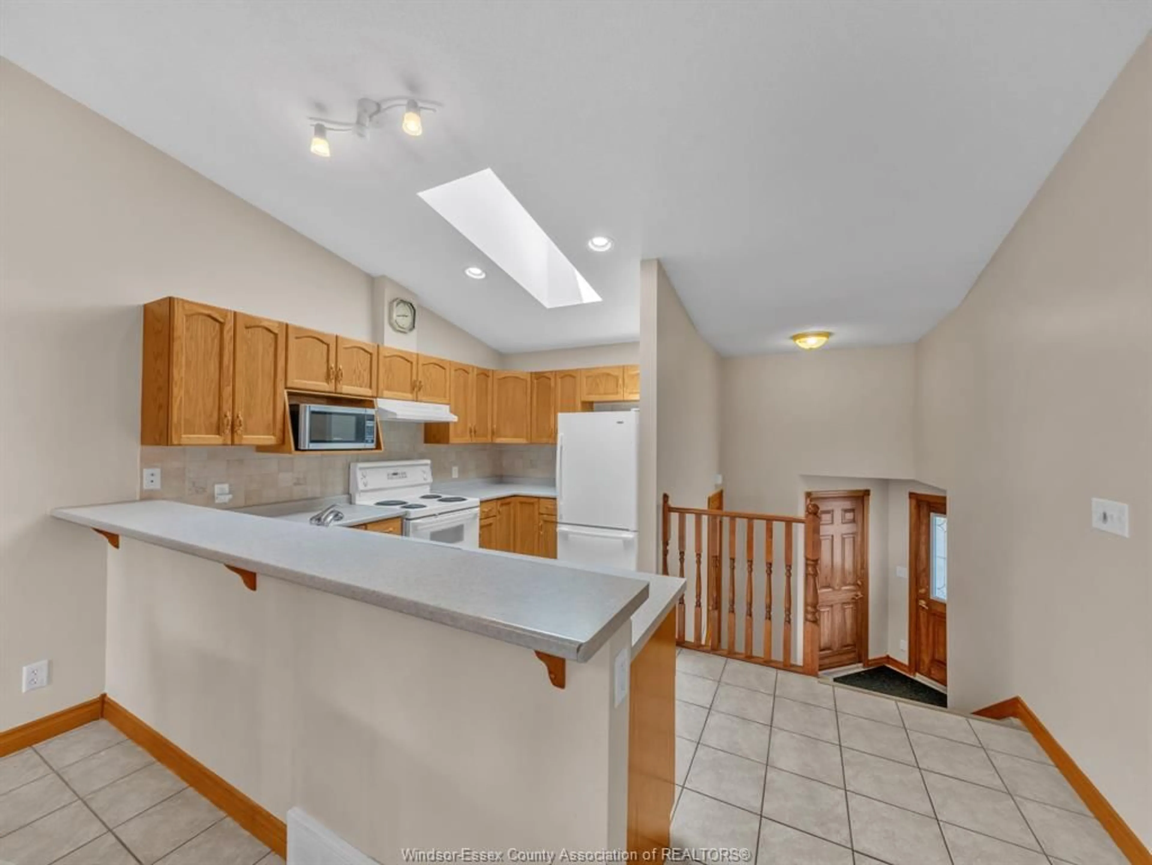 Open concept kitchen, ceramic/tile floor for 89 Peter Ave, Leamington Ontario N8H 5N9