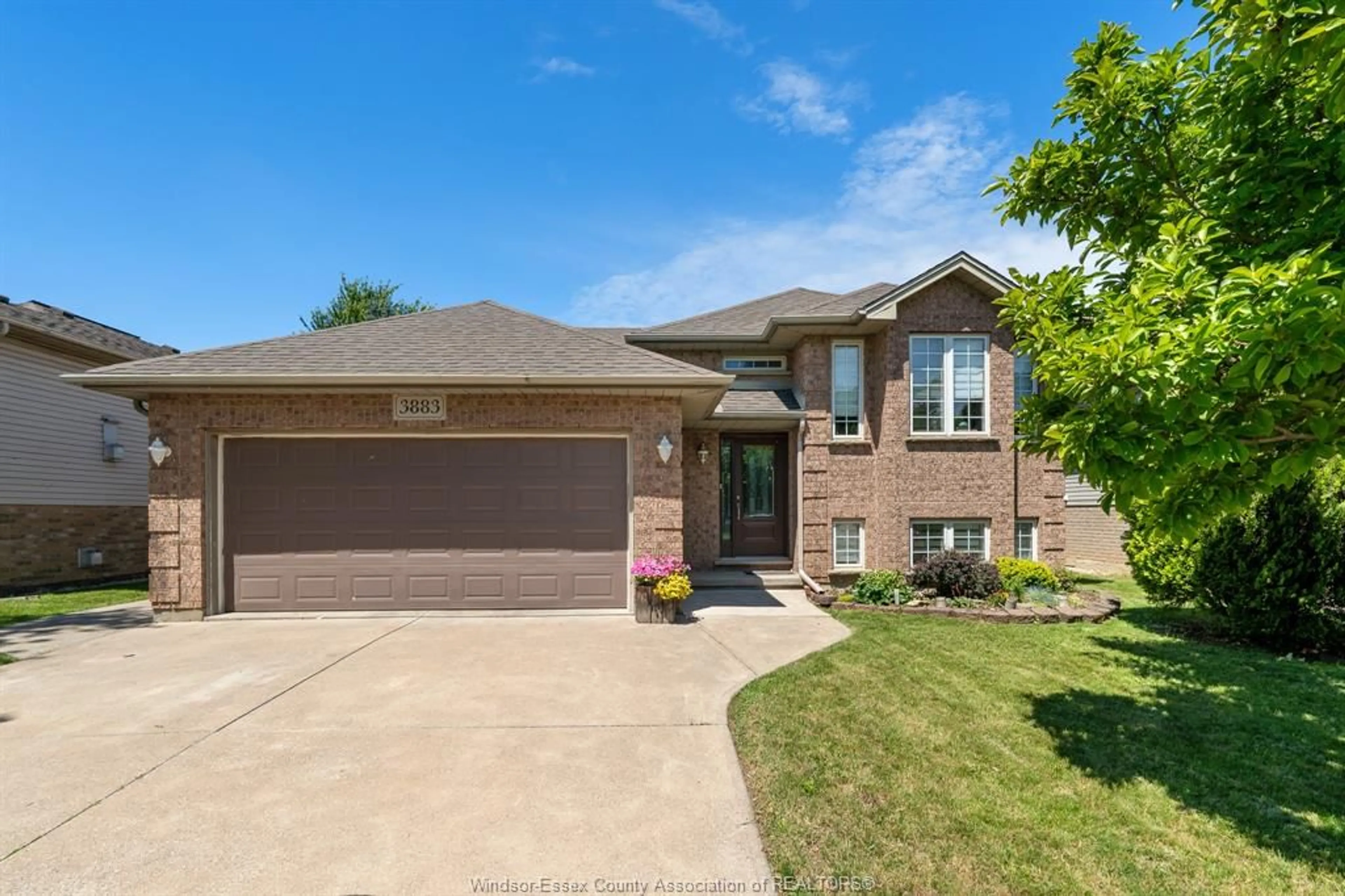 Home with brick exterior material, street for 3883 Aristotle Cres, Windsor Ontario N9G 2N9