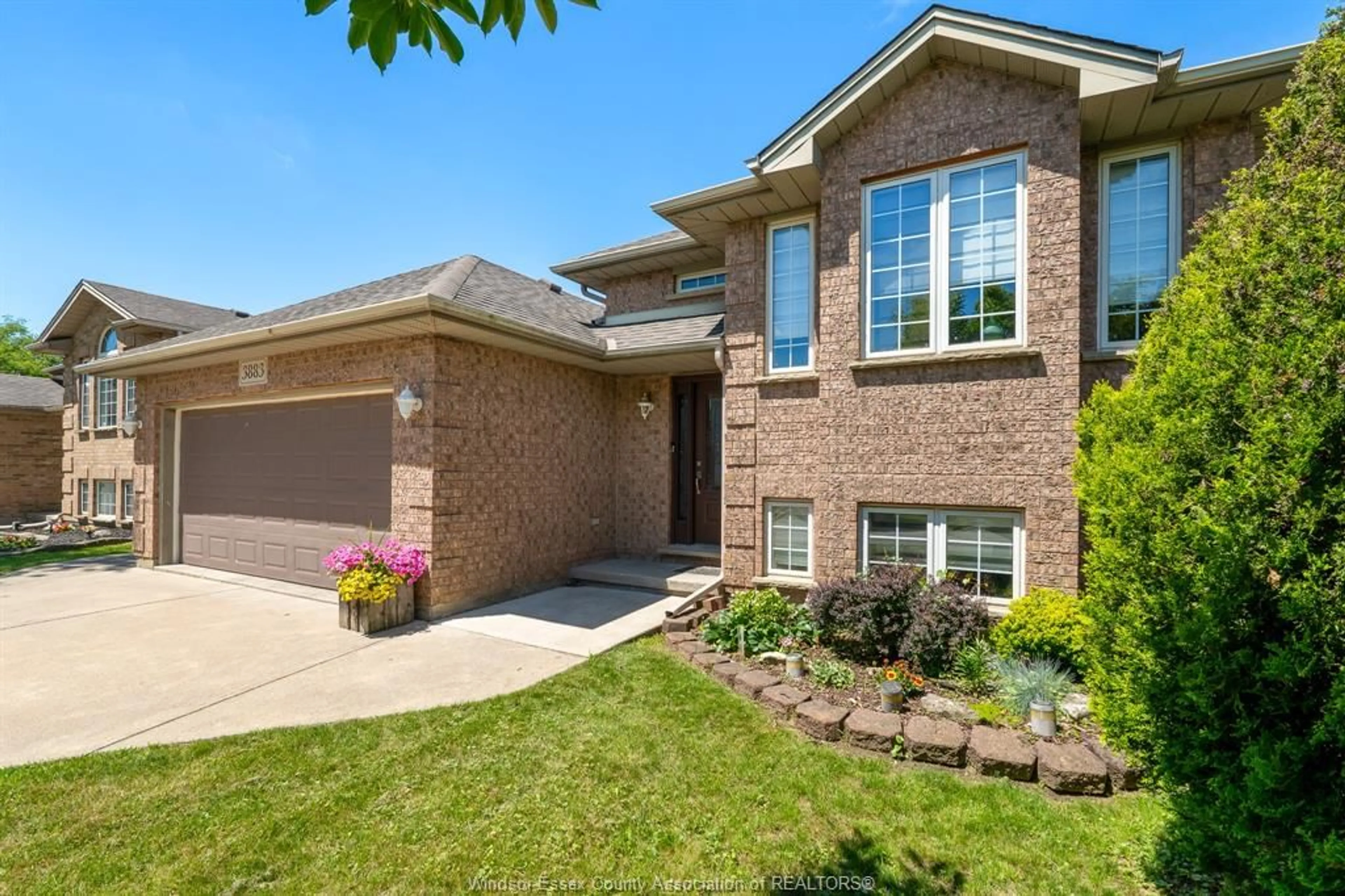 Home with brick exterior material, street for 3883 Aristotle Cres, Windsor Ontario N9G 2N9