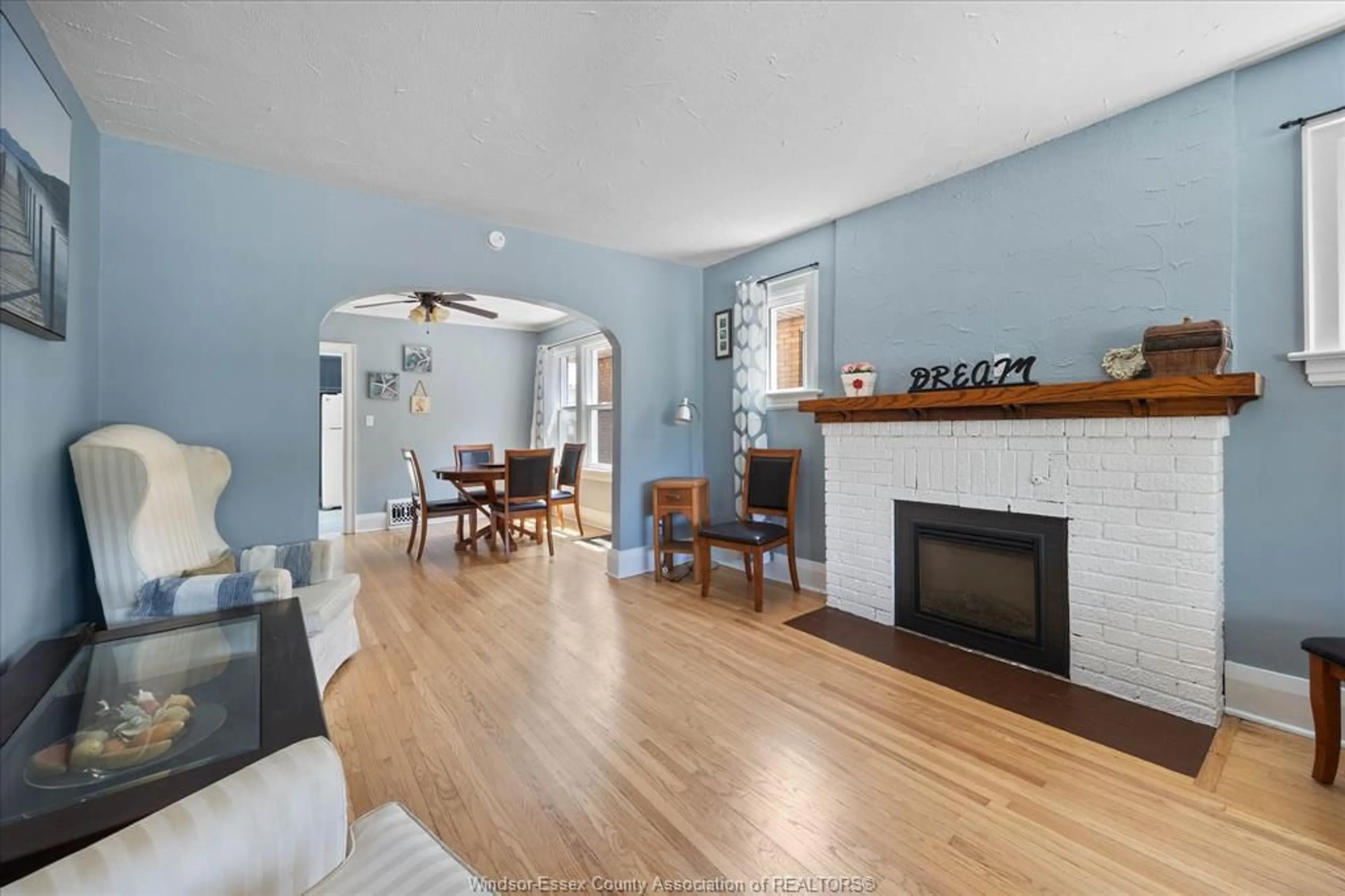 Living room with furniture, wood/laminate floor for 1422 Elsmere Ave, Windsor Ontario N8X 4G9