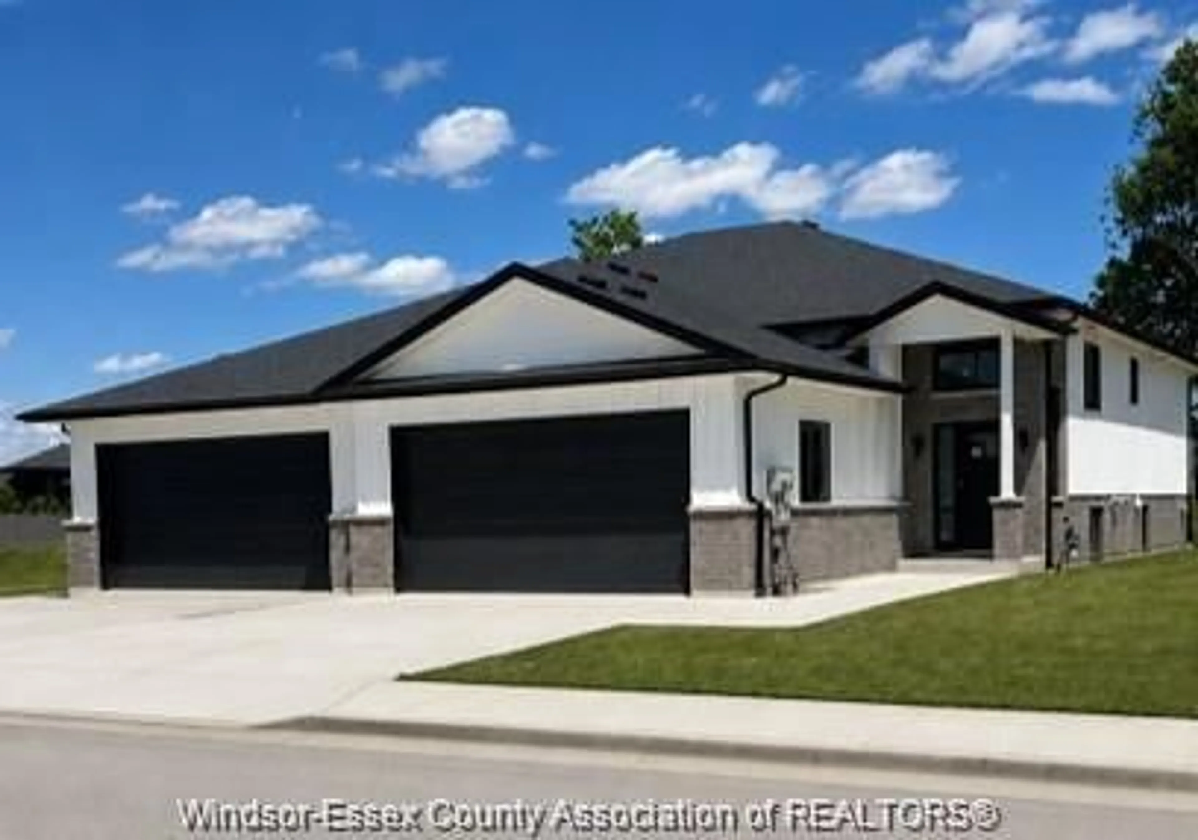 Home with vinyl exterior material, street for 47 SARKIS St, Kingsville Ontario N9Y 1J9