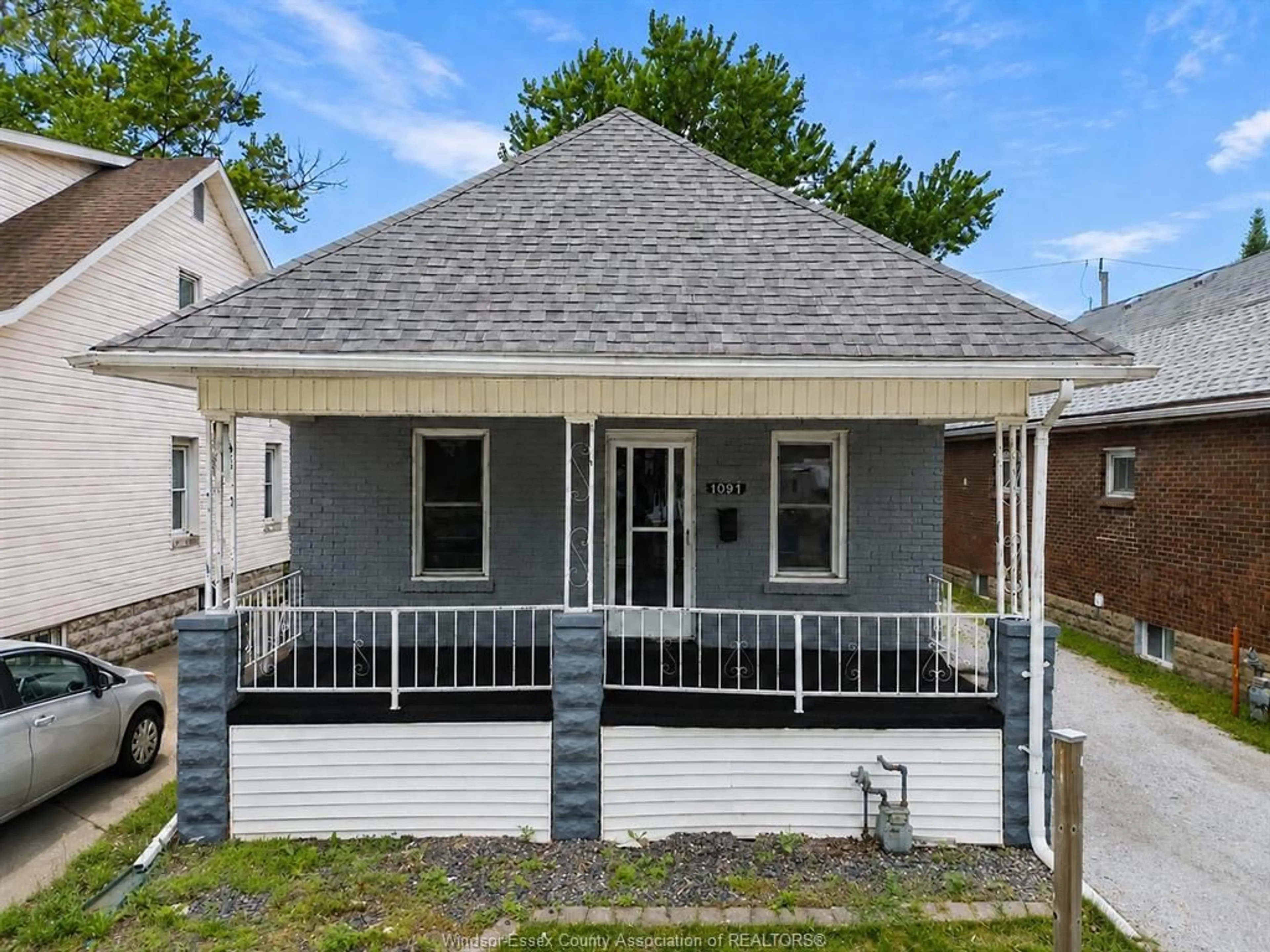 Home with vinyl exterior material, street for 1091 LENA, Windsor Ontario N9C 3K3