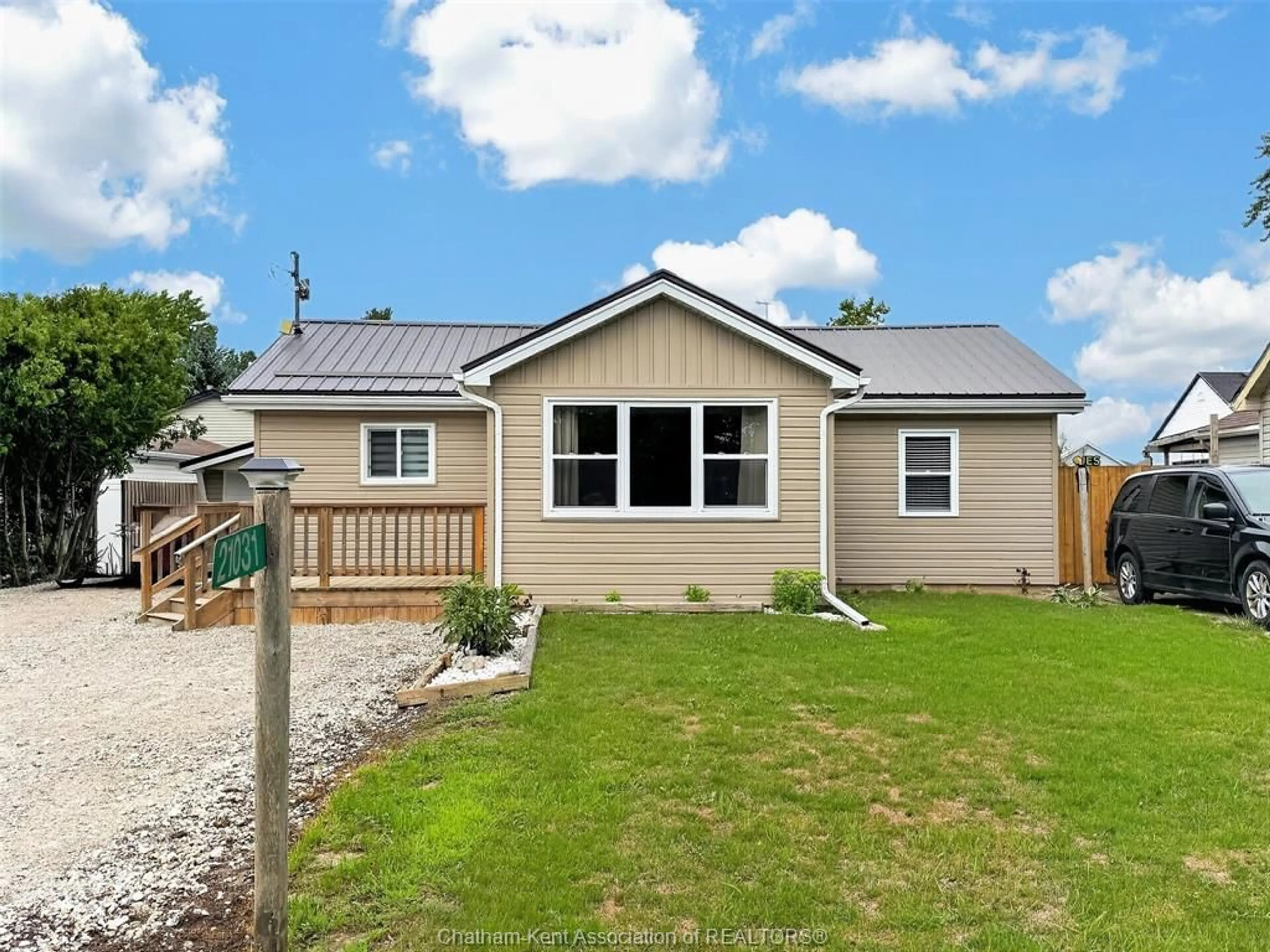 Home with vinyl exterior material, street for 21031 QUEEN St, Charing Cross Ontario N0P 1G0