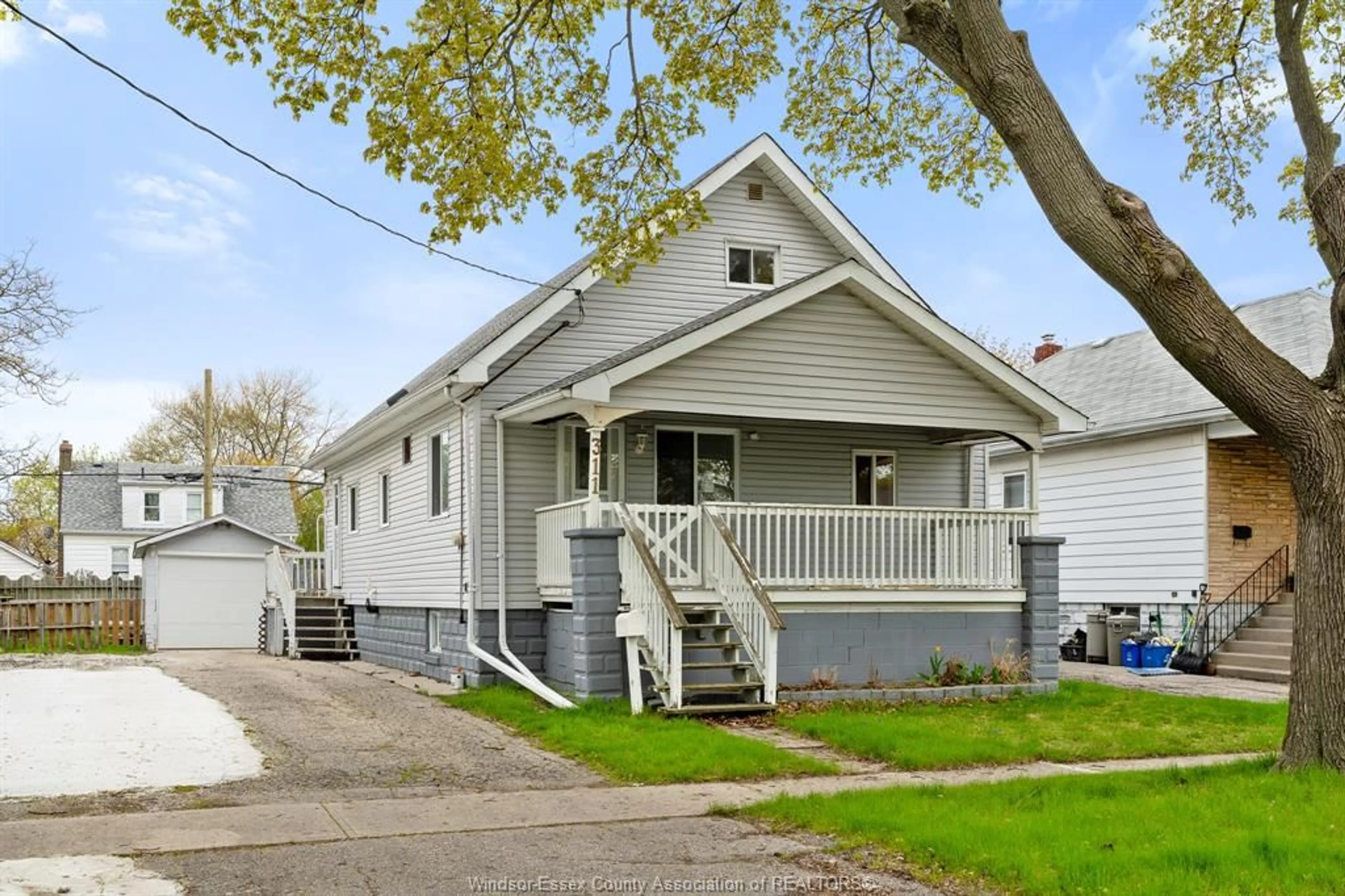 Home with vinyl exterior material, street for 311 CONRAD St, Sarnia Ontario N7T 3K4