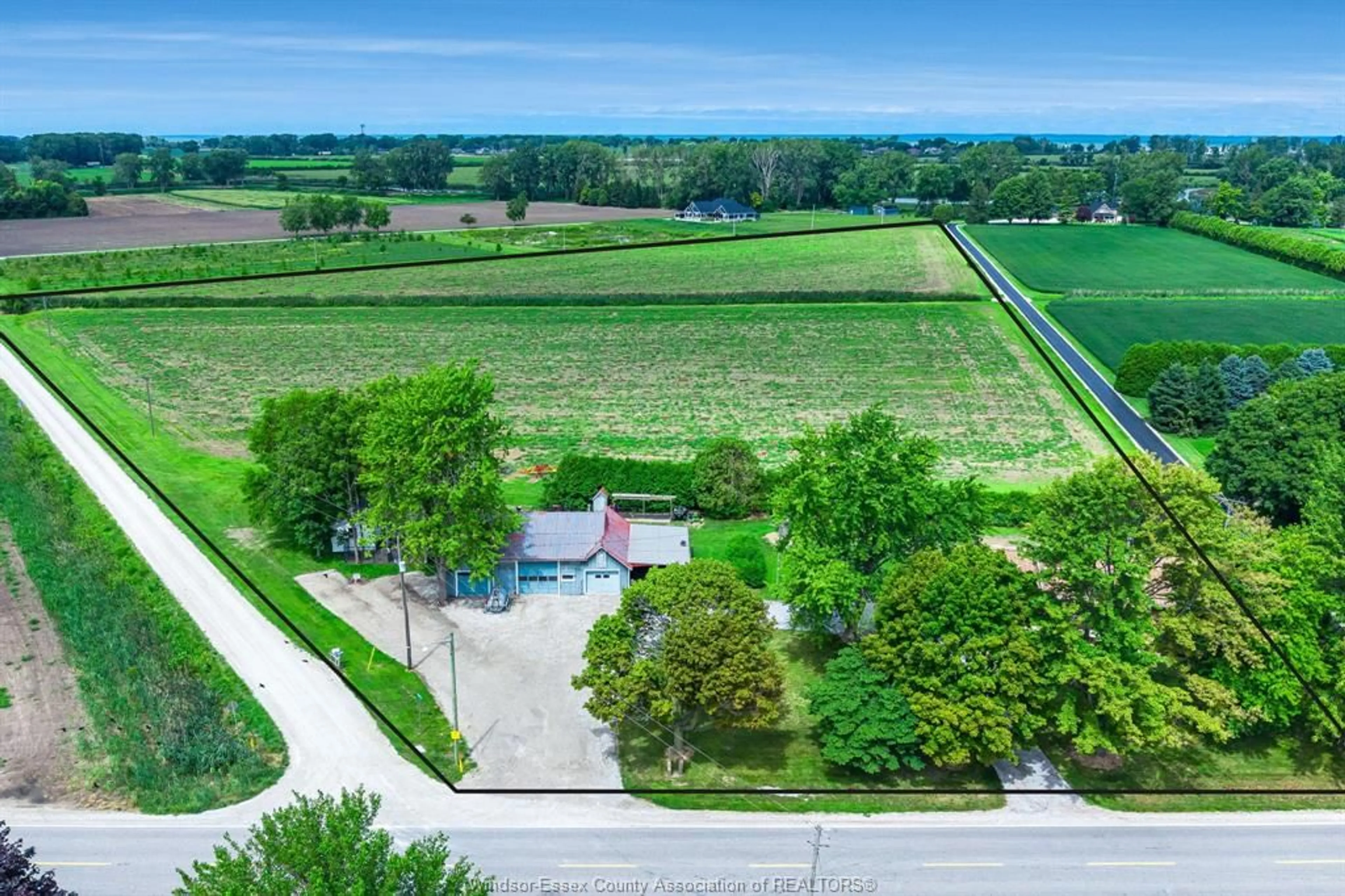 A pic from outside/outdoor area/front of a property/back of a property/a pic from drone, unknown for 21300 Tecumseh Rd, Tilbury North Ontario N0P 2L0