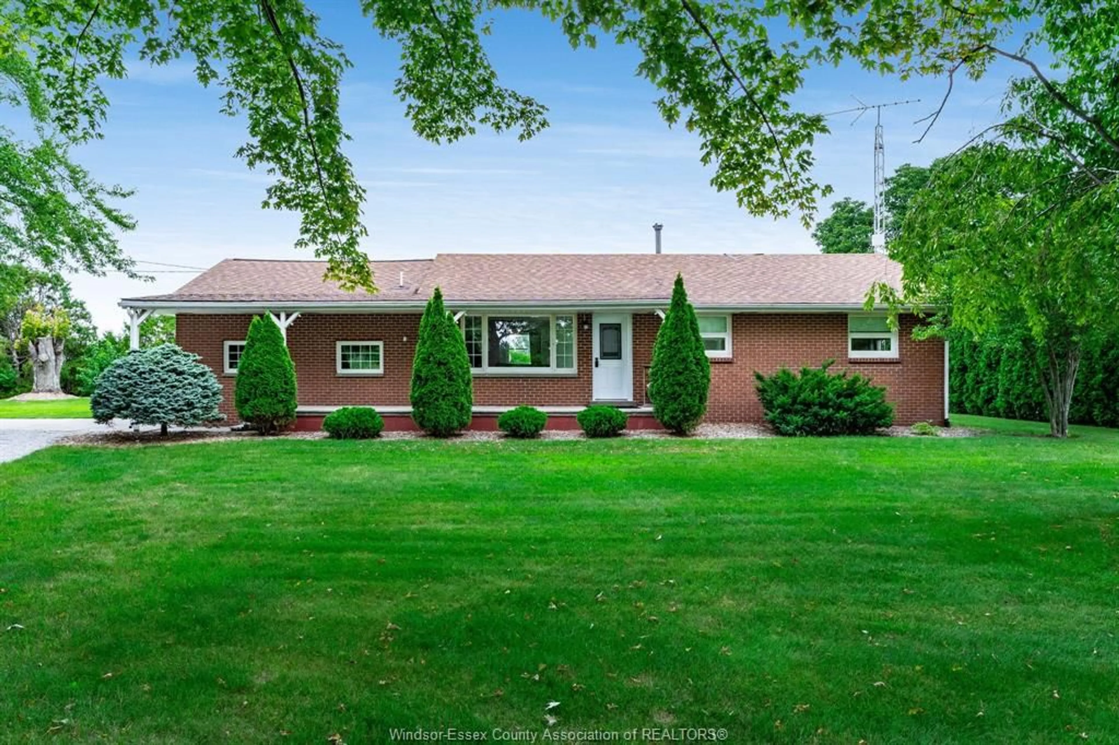 A pic from outside/outdoor area/front of a property/back of a property/a pic from drone, street for 21300 Tecumseh Rd, Tilbury North Ontario N0P 2L0