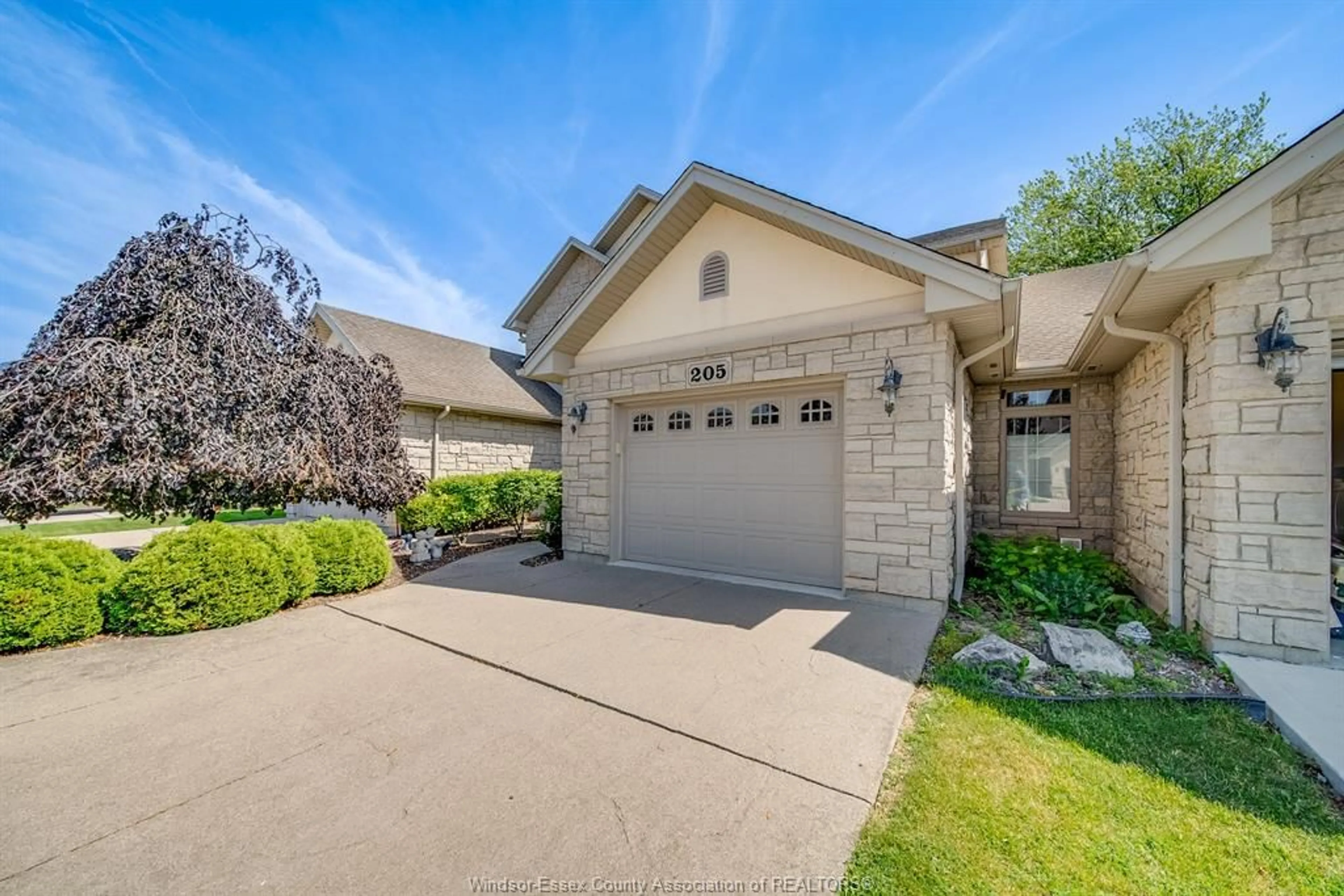 Home with brick exterior material, street for 205 WHISPER CREEK Cir, Tecumseh Ontario N9K 1G3