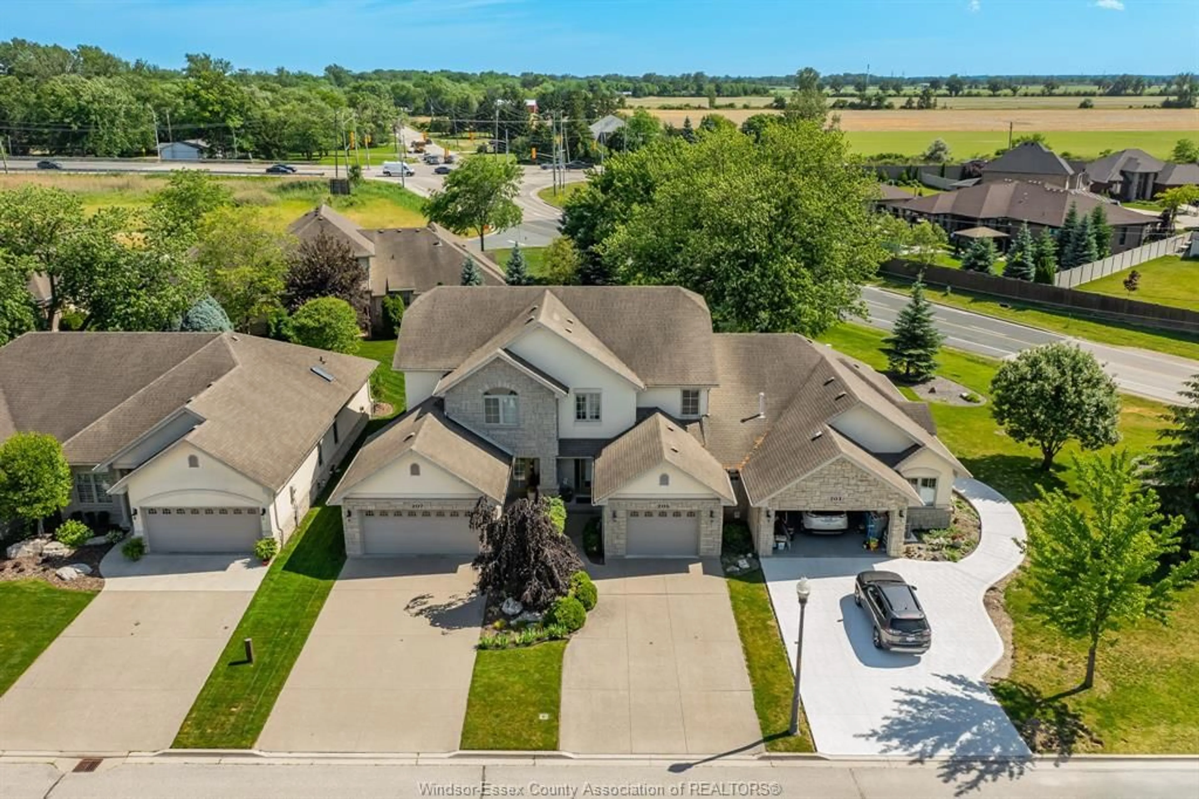A pic from outside/outdoor area/front of a property/back of a property/a pic from drone, unknown for 205 WHISPER CREEK Cir, Tecumseh Ontario N9K 1G3