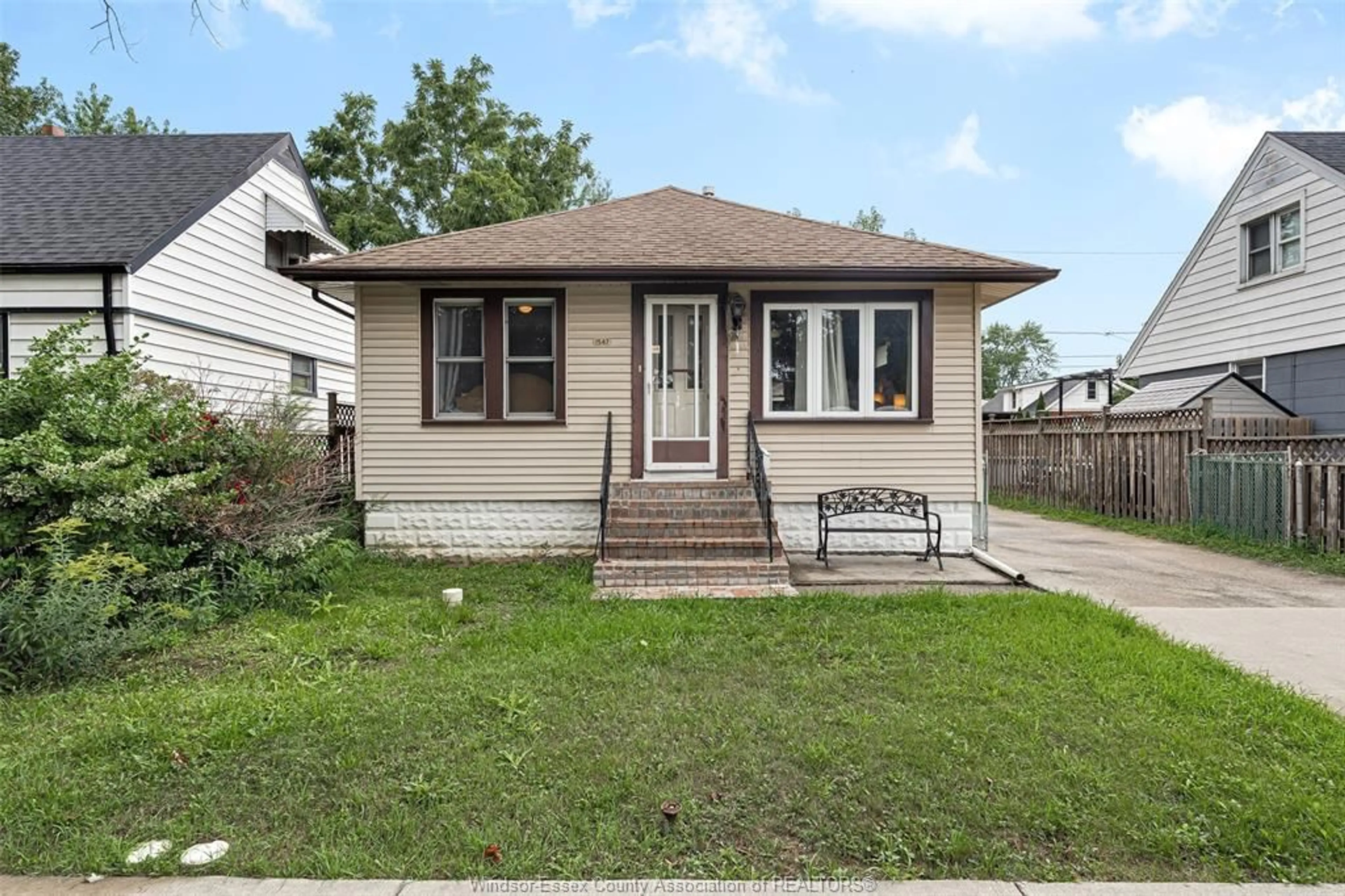Home with vinyl exterior material, street for 1547 ELLROSE Ave, Windsor Ontario N8Y 3X6