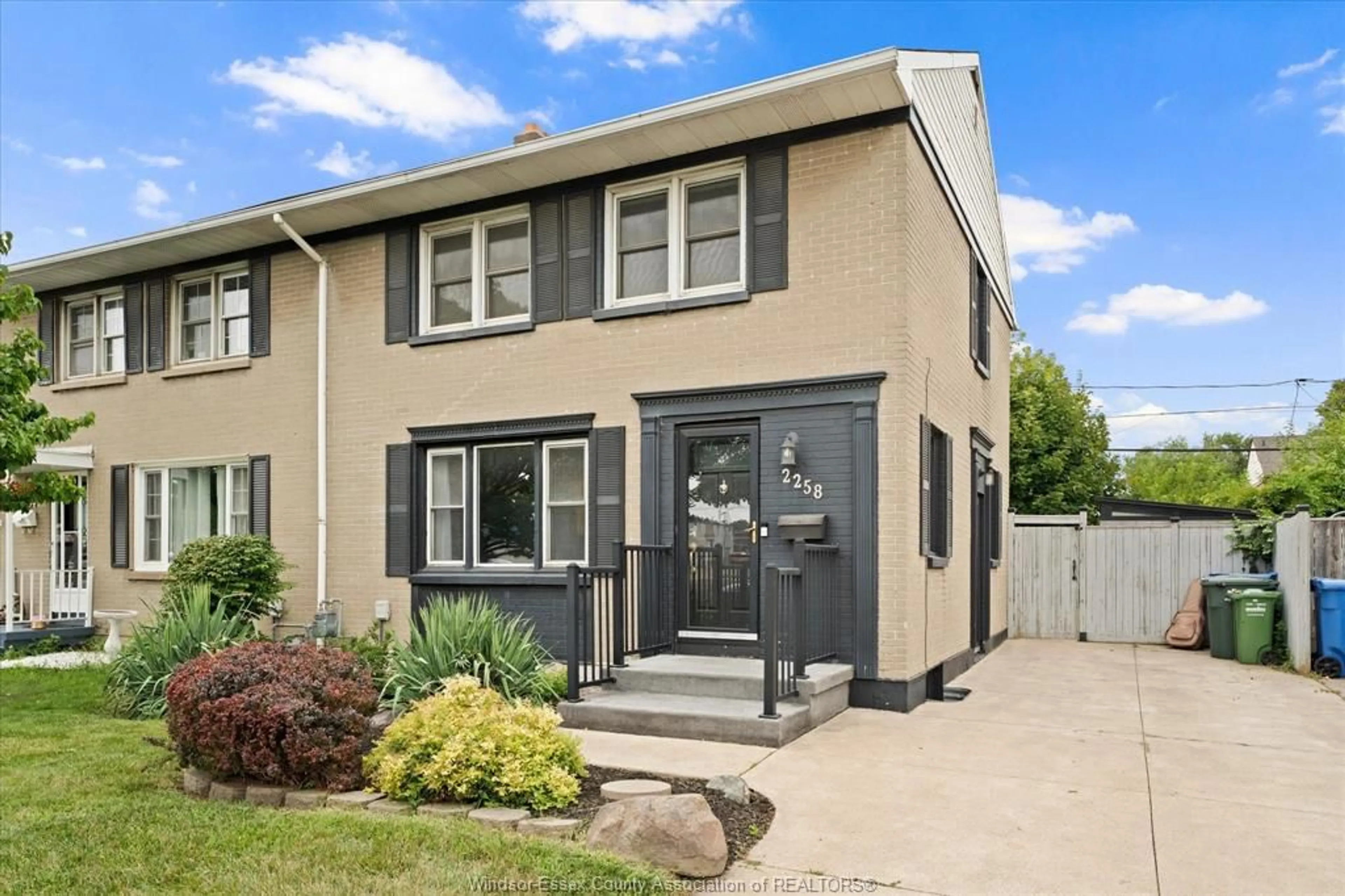 Home with vinyl exterior material, street for 2258 TECUMSEH Rd, Windsor Ontario N9B 1W1