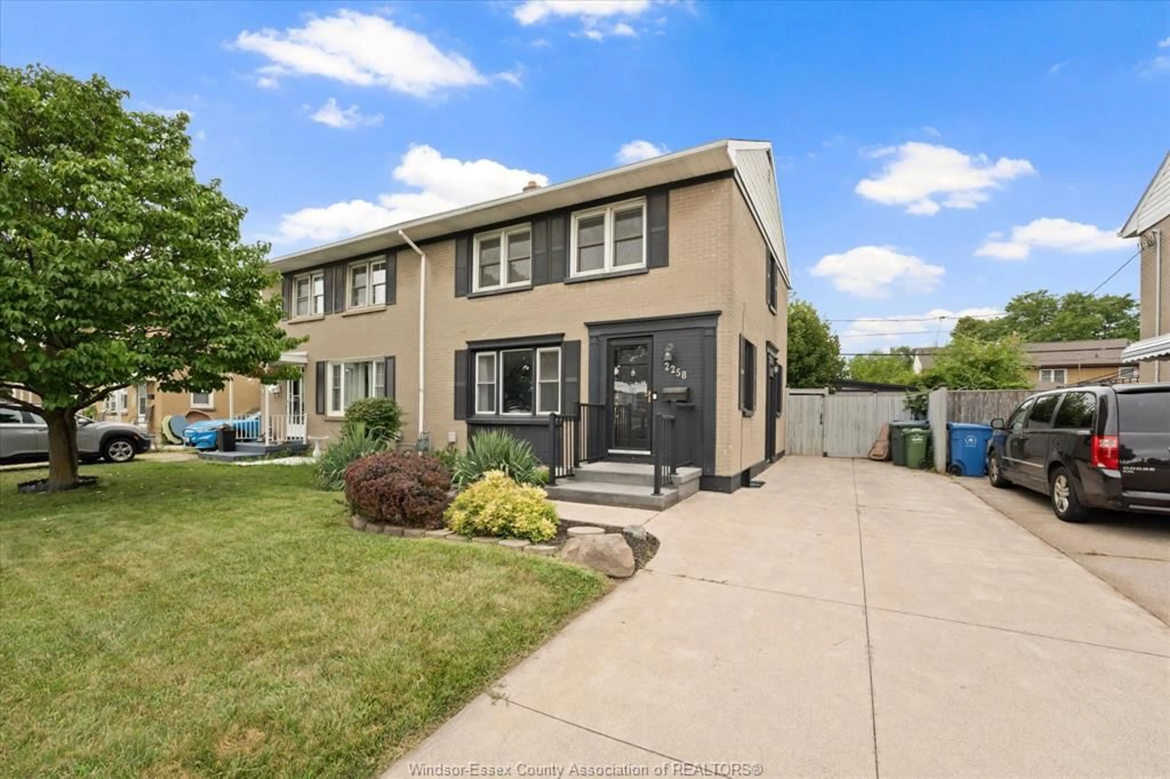 Home with vinyl exterior material, street for 2258 TECUMSEH Rd, Windsor Ontario N9B 1W1