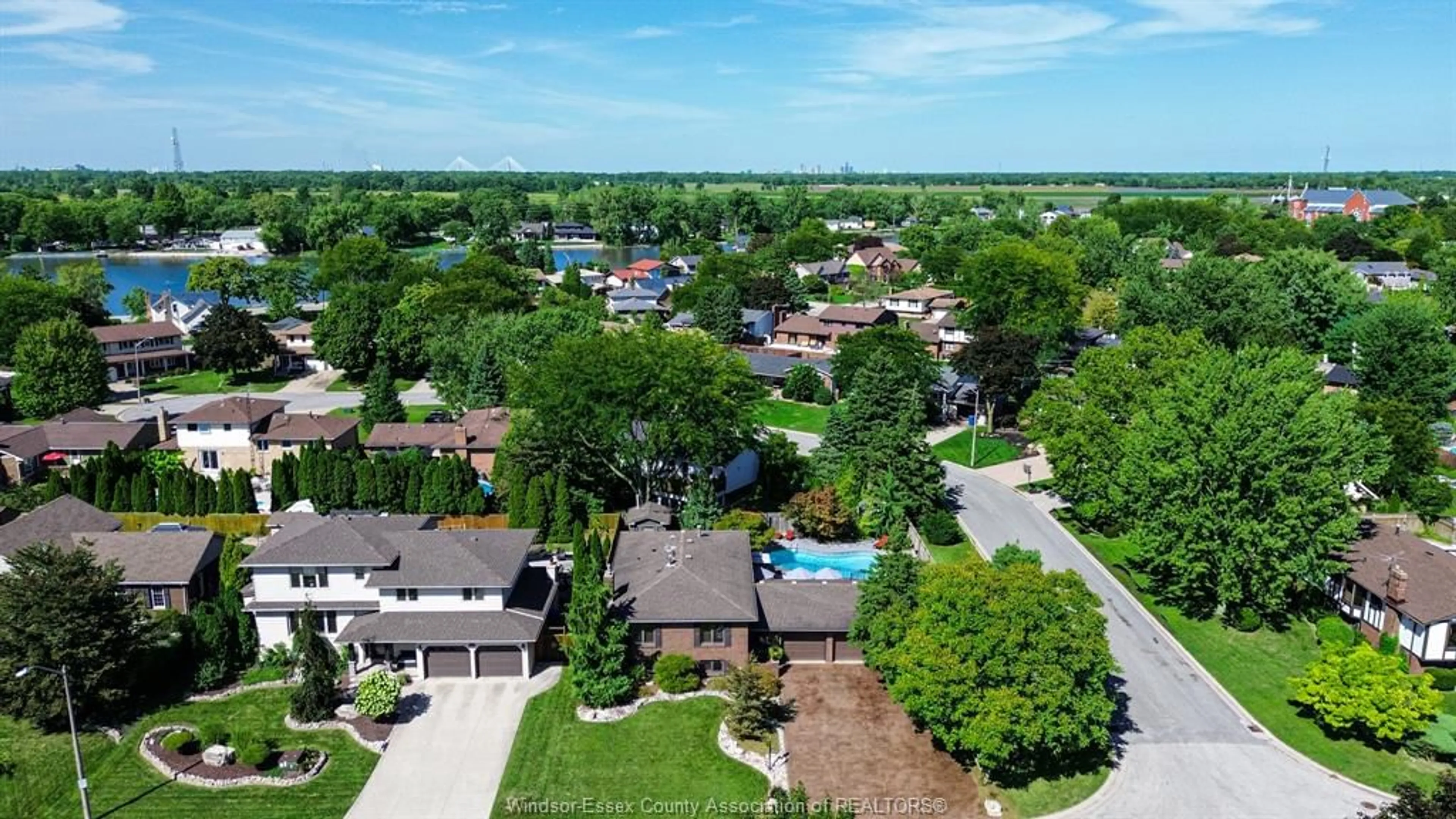 A pic from outside/outdoor area/front of a property/back of a property/a pic from drone, water/lake/river/ocean view for 284 BENETEAU, River Canard Ontario N9V 3R3