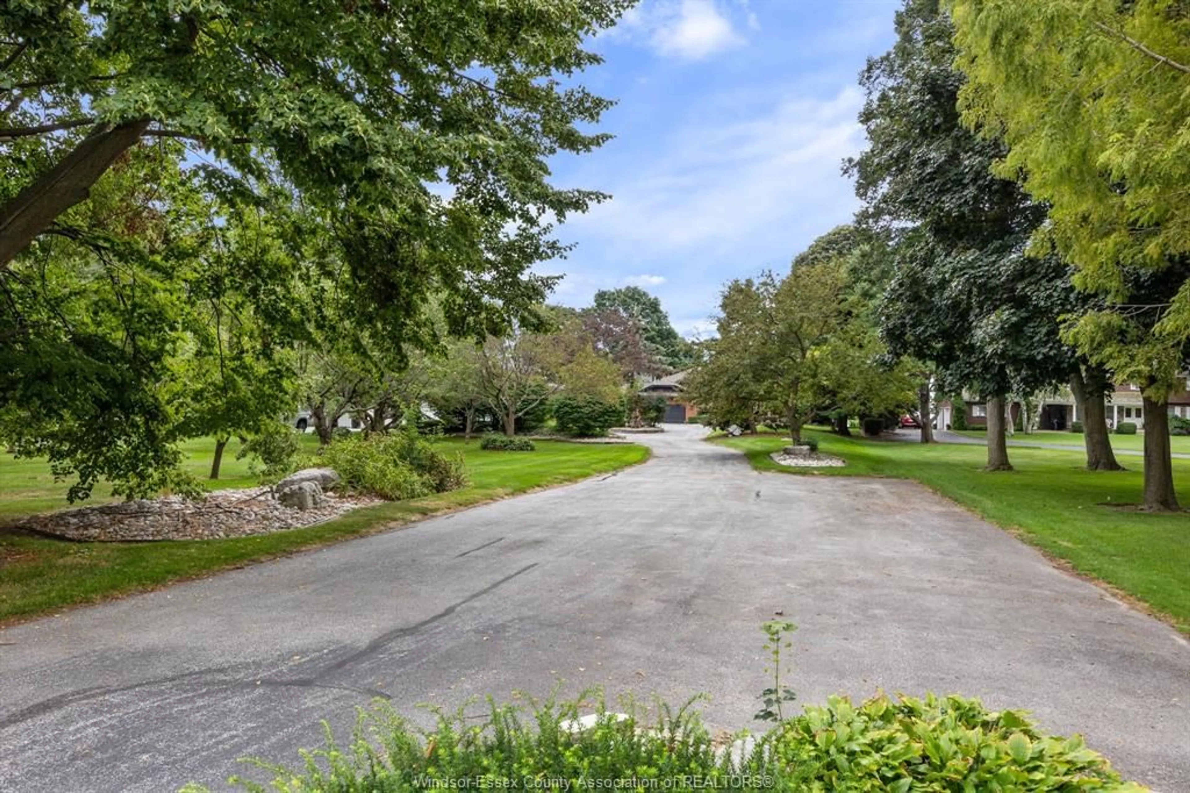 A pic from outside/outdoor area/front of a property/back of a property/a pic from drone, street for 881 COUNTY ROAD 50, Essex Ontario N0R 1G0