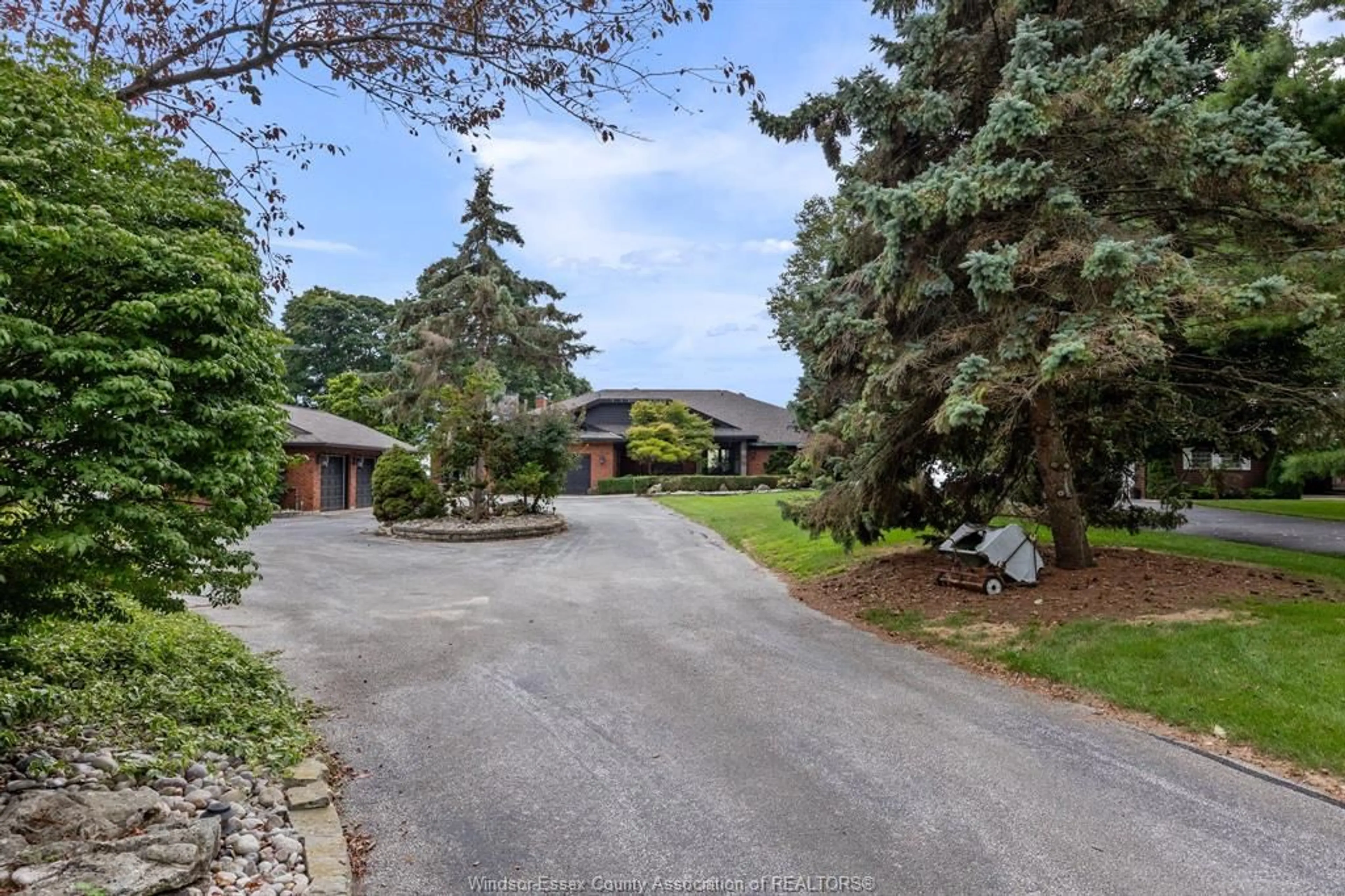 A pic from outside/outdoor area/front of a property/back of a property/a pic from drone, street for 881 COUNTY ROAD 50, Essex Ontario N0R 1G0