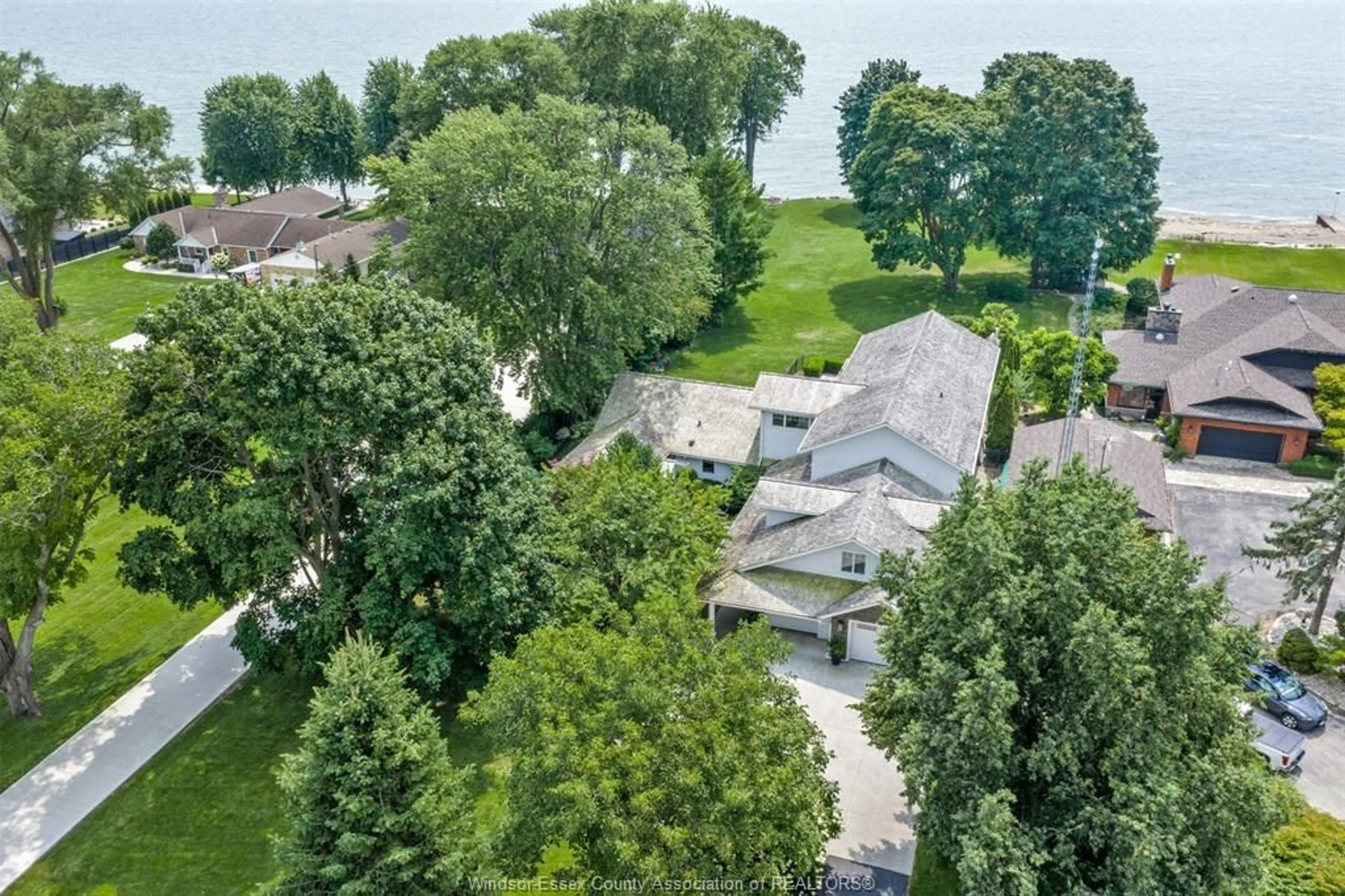 A pic from outside/outdoor area/front of a property/back of a property/a pic from drone, water/lake/river/ocean view for 885 COUNTY RD 50, Essex Ontario N0R 1G0