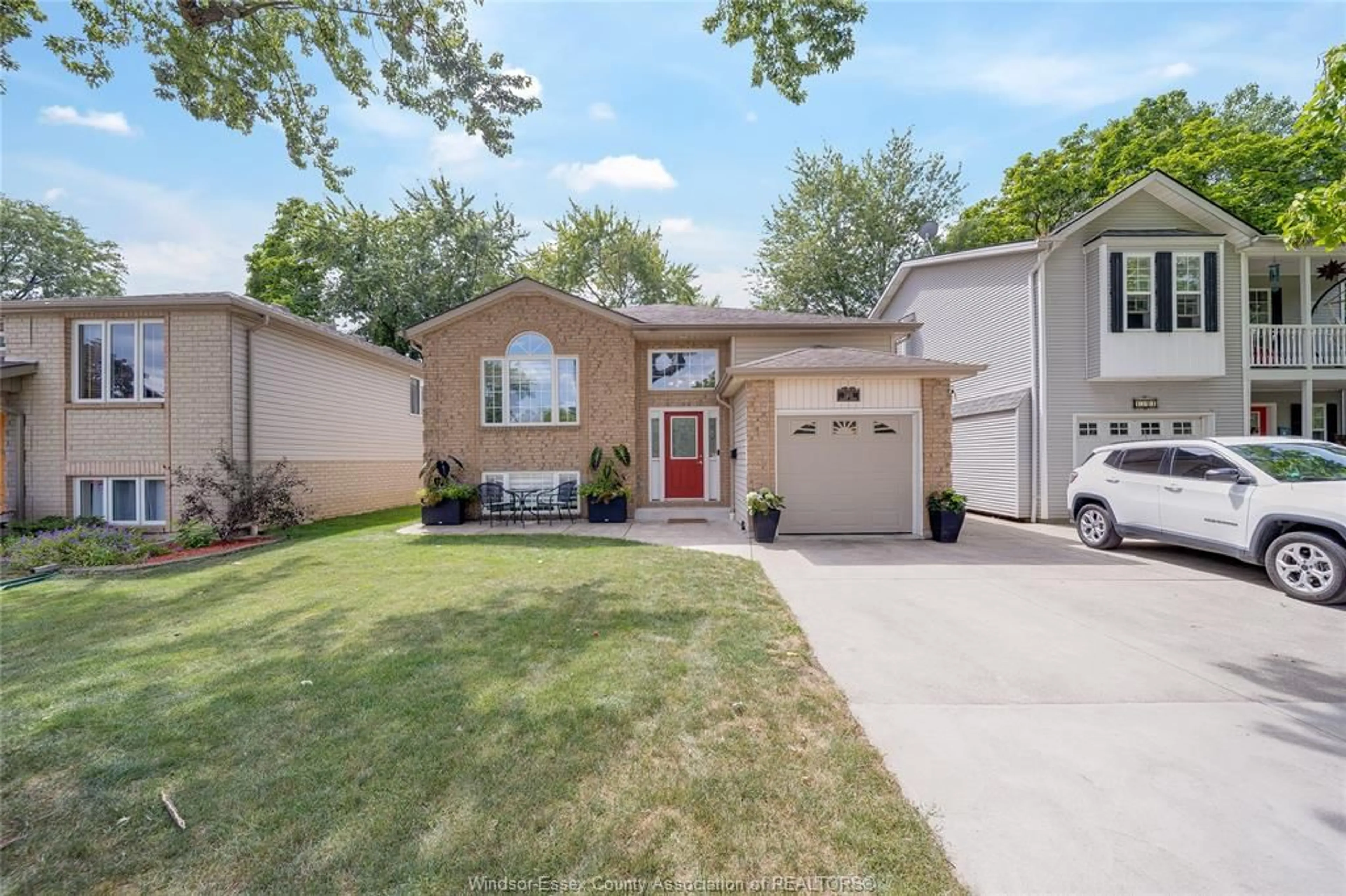 Home with vinyl exterior material, street for 1309 ELLROSE, Windsor Ontario N8Y 3X3