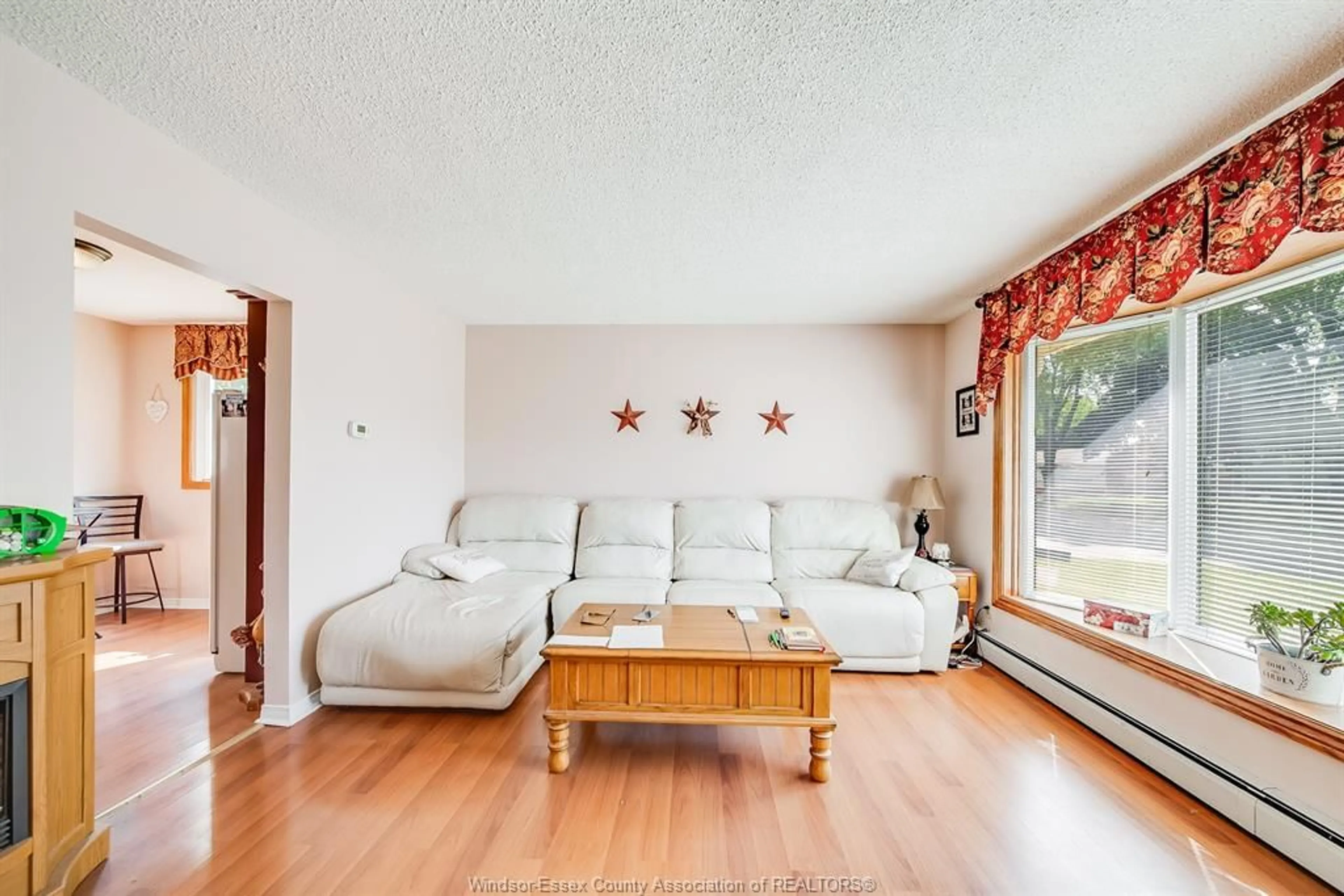 Living room with furniture, unknown for 5122 COLBOURNE Dr, Windsor Ontario N8T 1T8