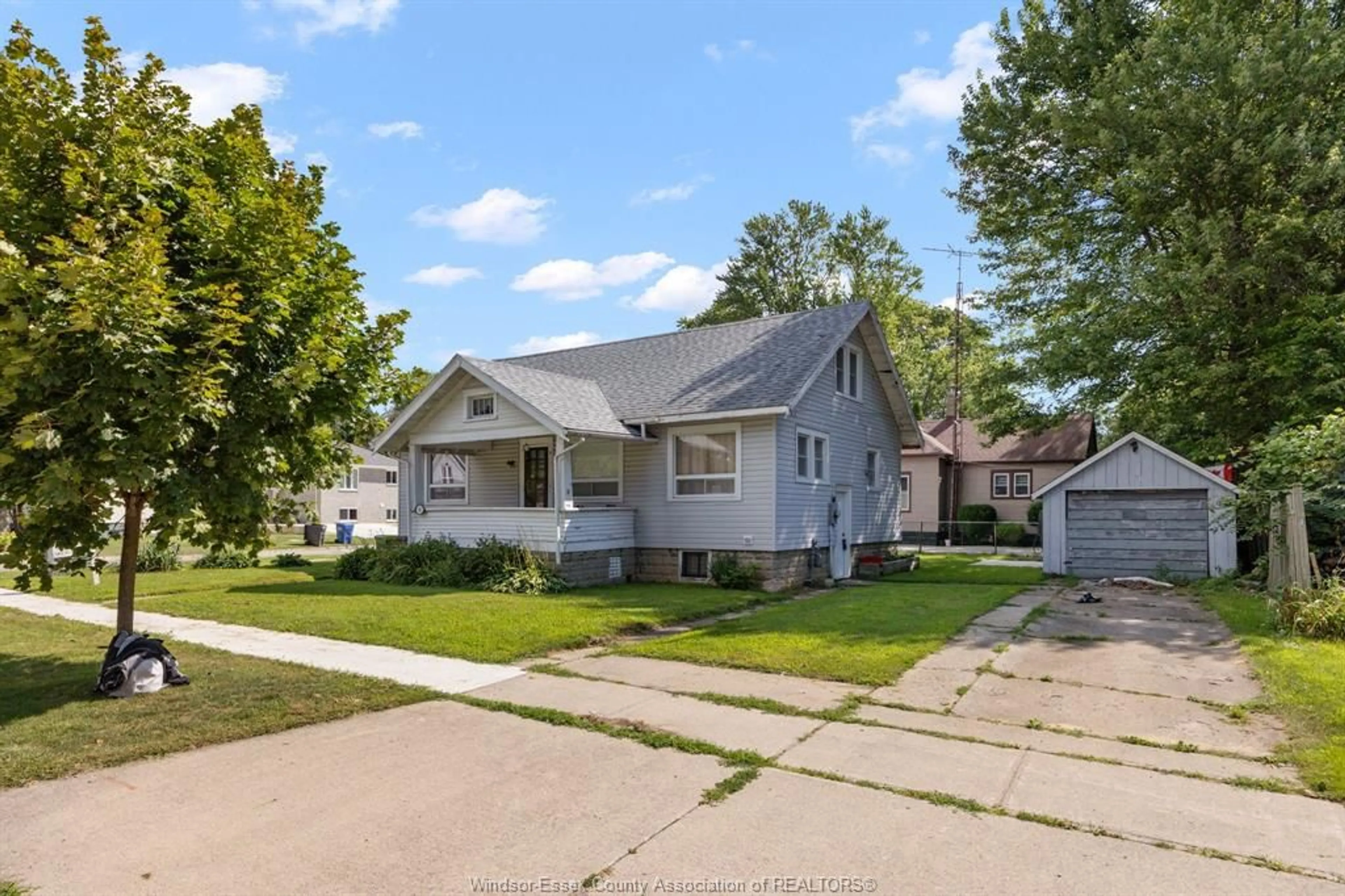 A pic from outside/outdoor area/front of a property/back of a property/a pic from drone, street for 56 WIGLE, Leamington Ontario N8H 2S9