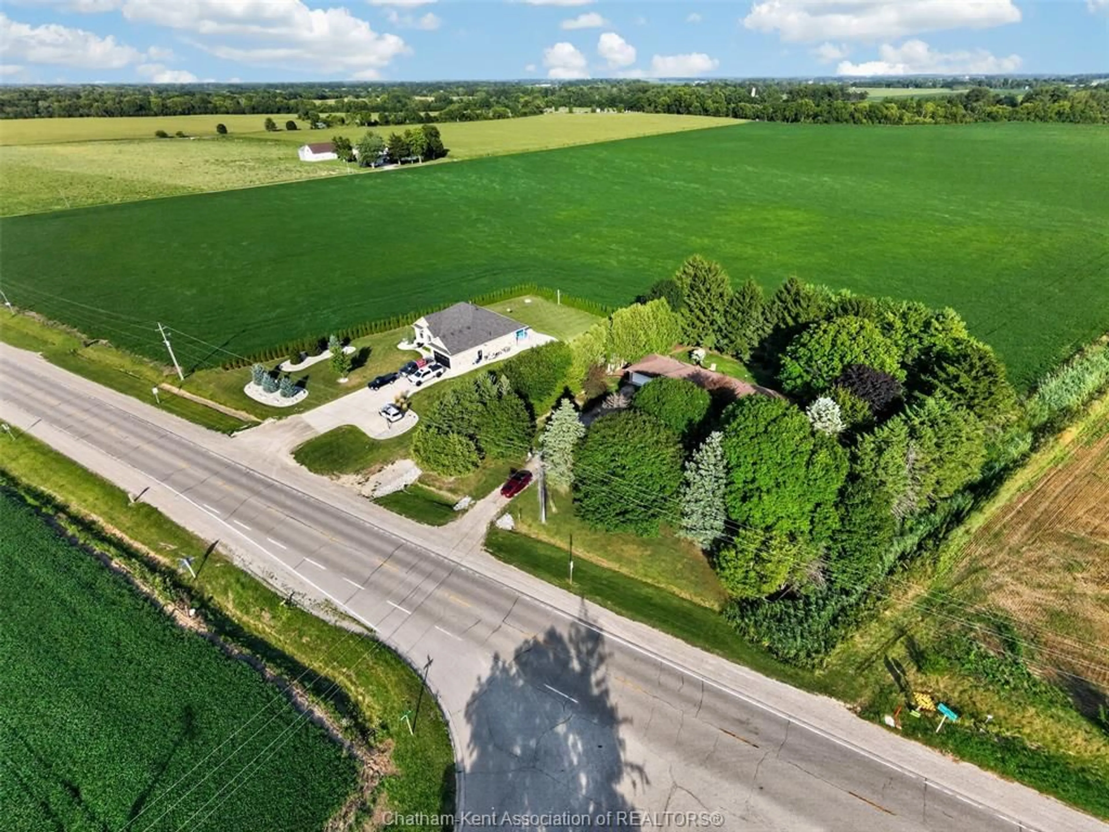 A pic from outside/outdoor area/front of a property/back of a property/a pic from drone, street for 10156 Longwoods Rd, Chatham Ontario N7M 5J7
