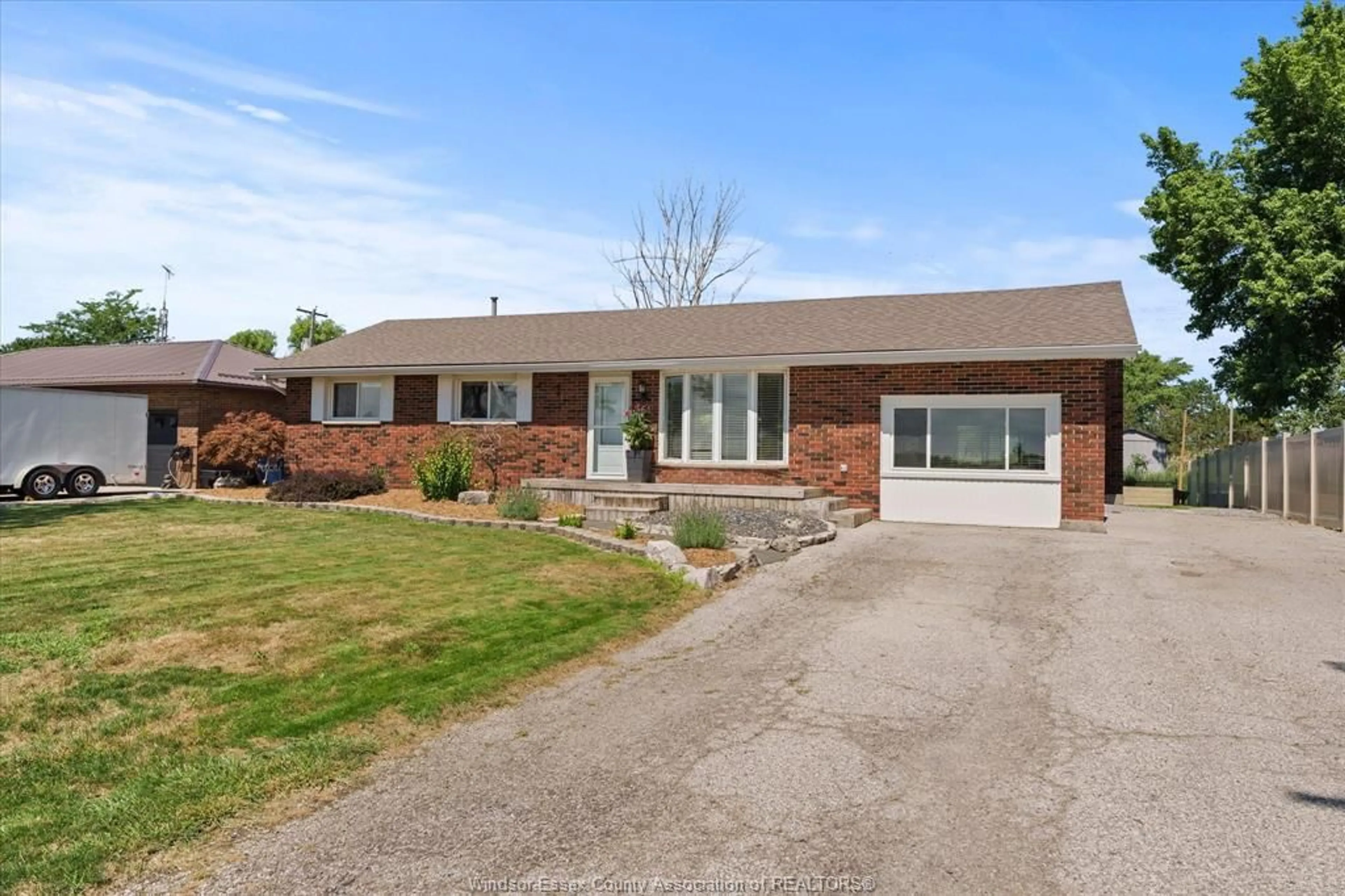 Home with brick exterior material, street for 561 COUNTY RD 2, Lakeshore Ontario N8L 1J9