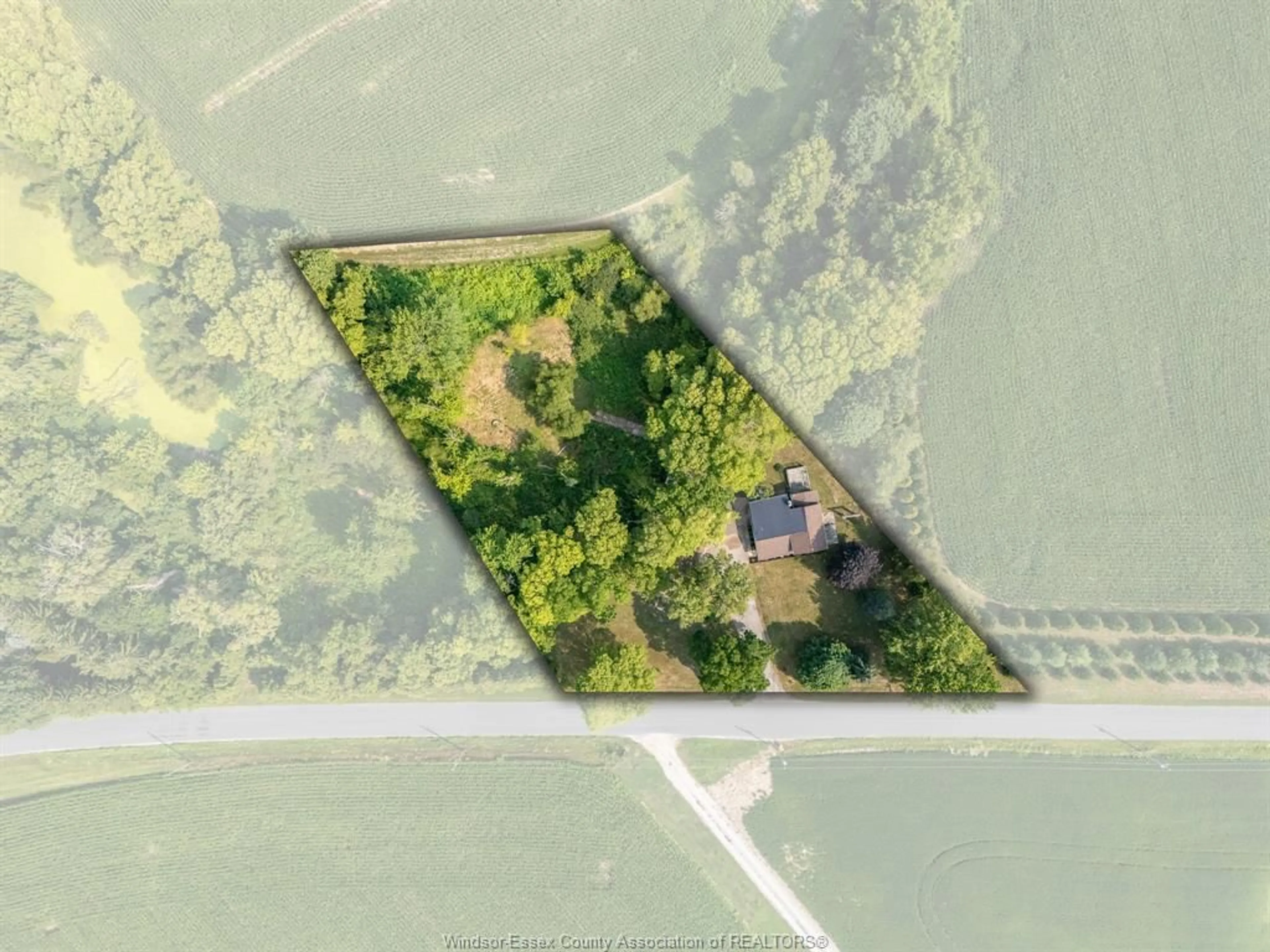 A pic from outside/outdoor area/front of a property/back of a property/a pic from drone, water/lake/river/ocean view for 11787 River Line, Thamesville Ontario N0P 1V0
