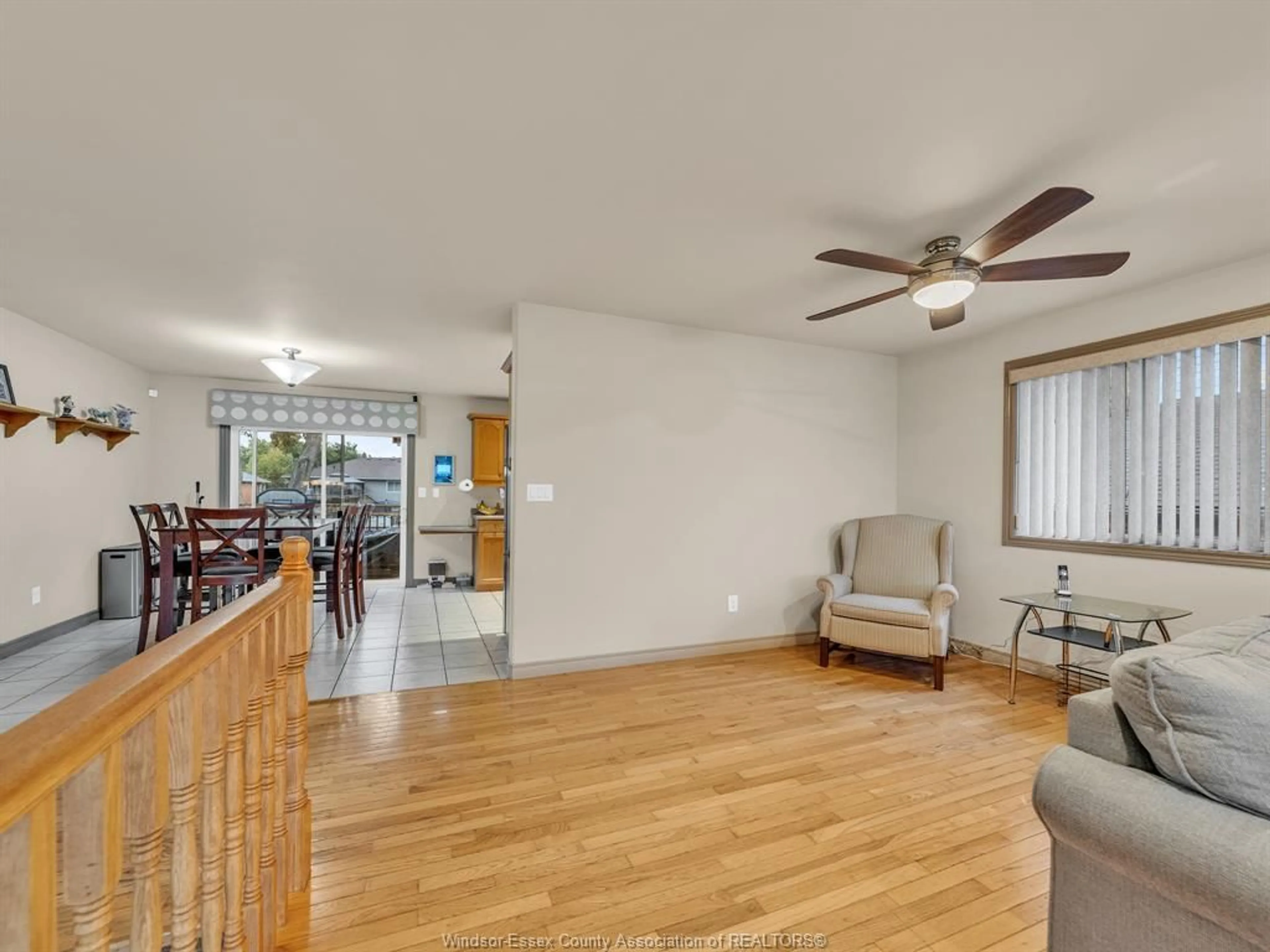 Living room with furniture, wood/laminate floor for 9 Lyle St, Cottam Ontario N0R 1B0