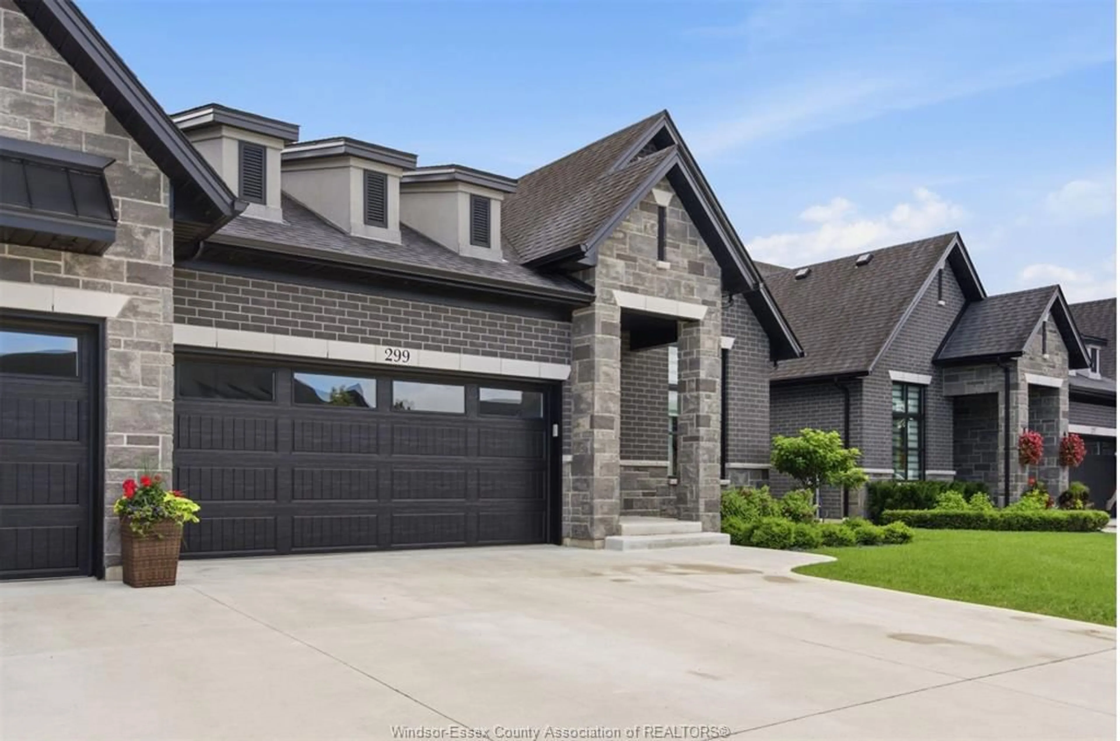 Home with brick exterior material, street for 299 XAVIER Cir, Lakeshore Ontario N8N 0J3