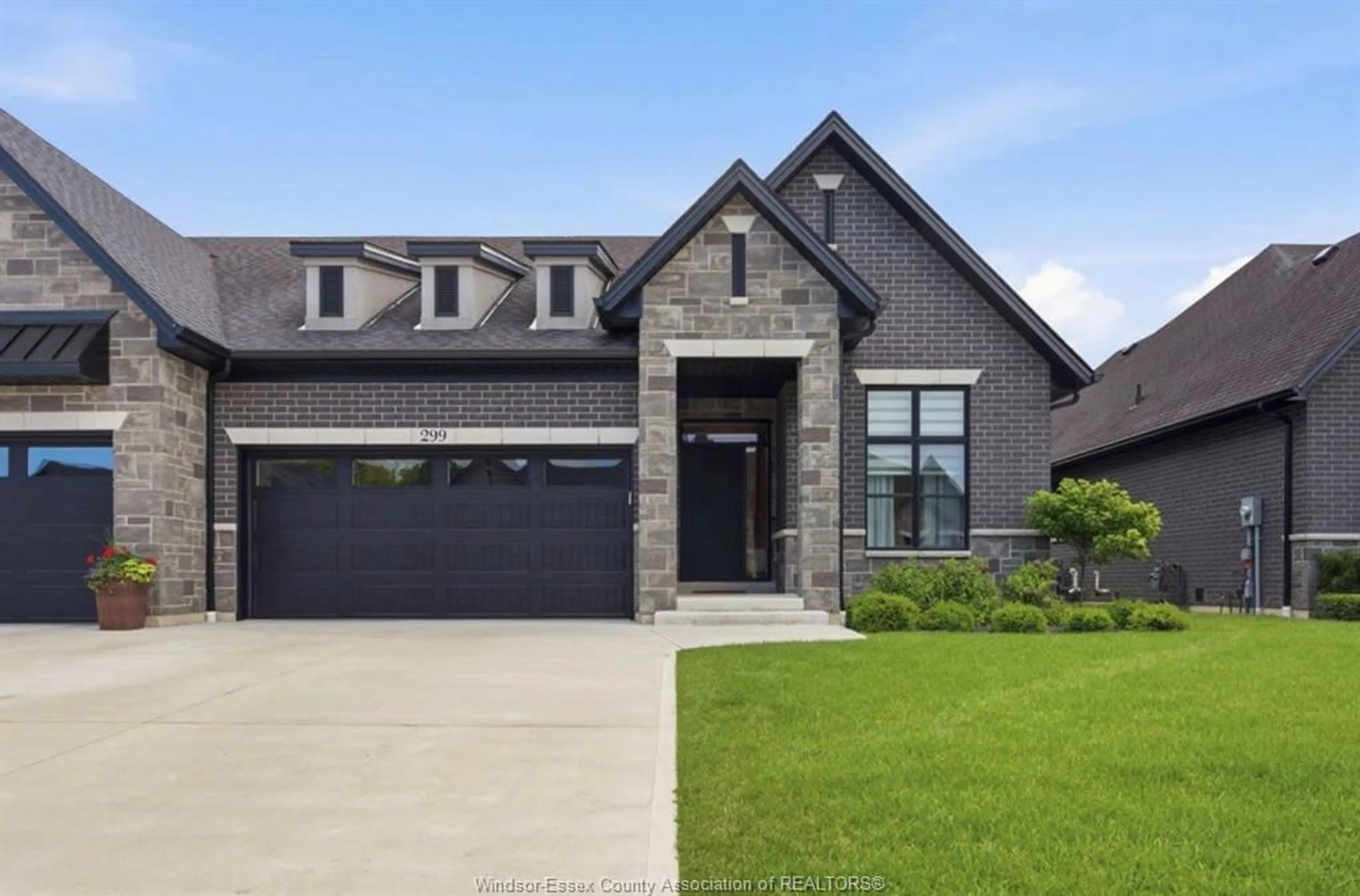 Home with brick exterior material, street for 299 XAVIER Cir, Lakeshore Ontario N8N 0J3
