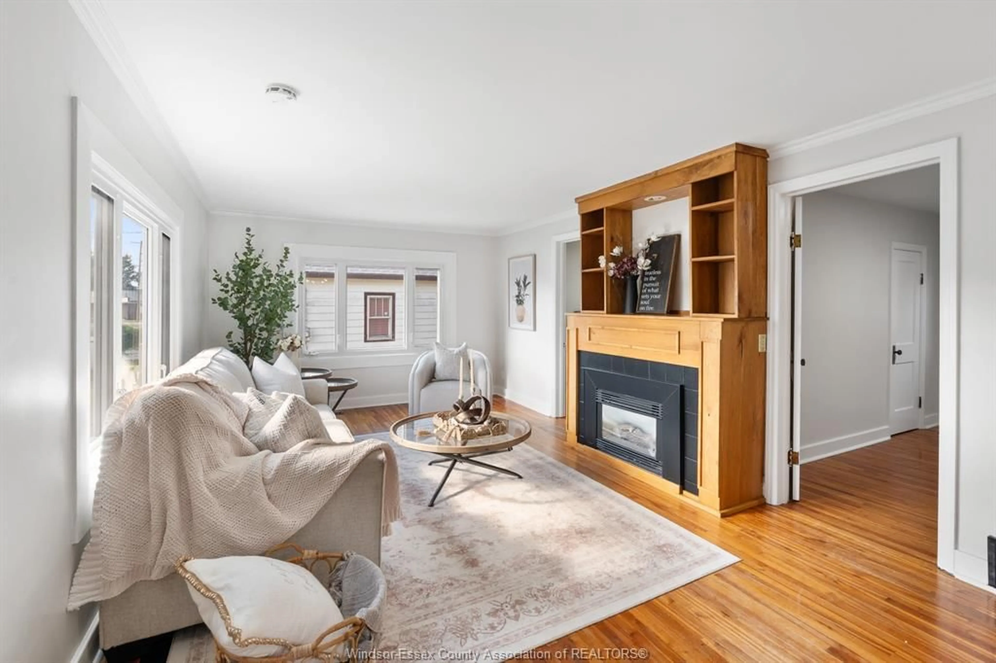 Living room with furniture, wood/laminate floor for 15 John St W, Blenheim Ontario N0P 1A0