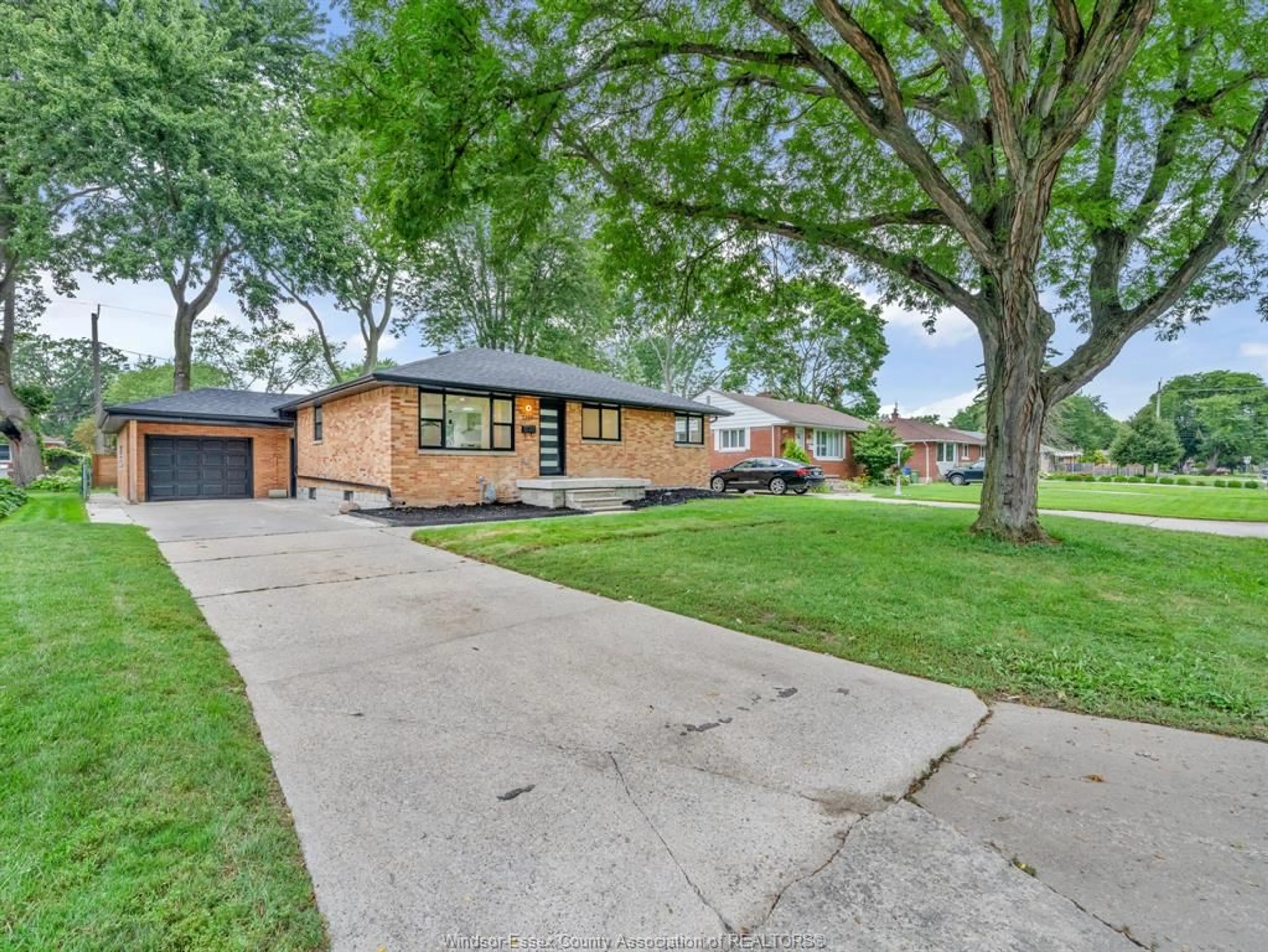 Home with brick exterior material, street for 3237 Mckay Ave, Windsor Ontario N9E 2R6