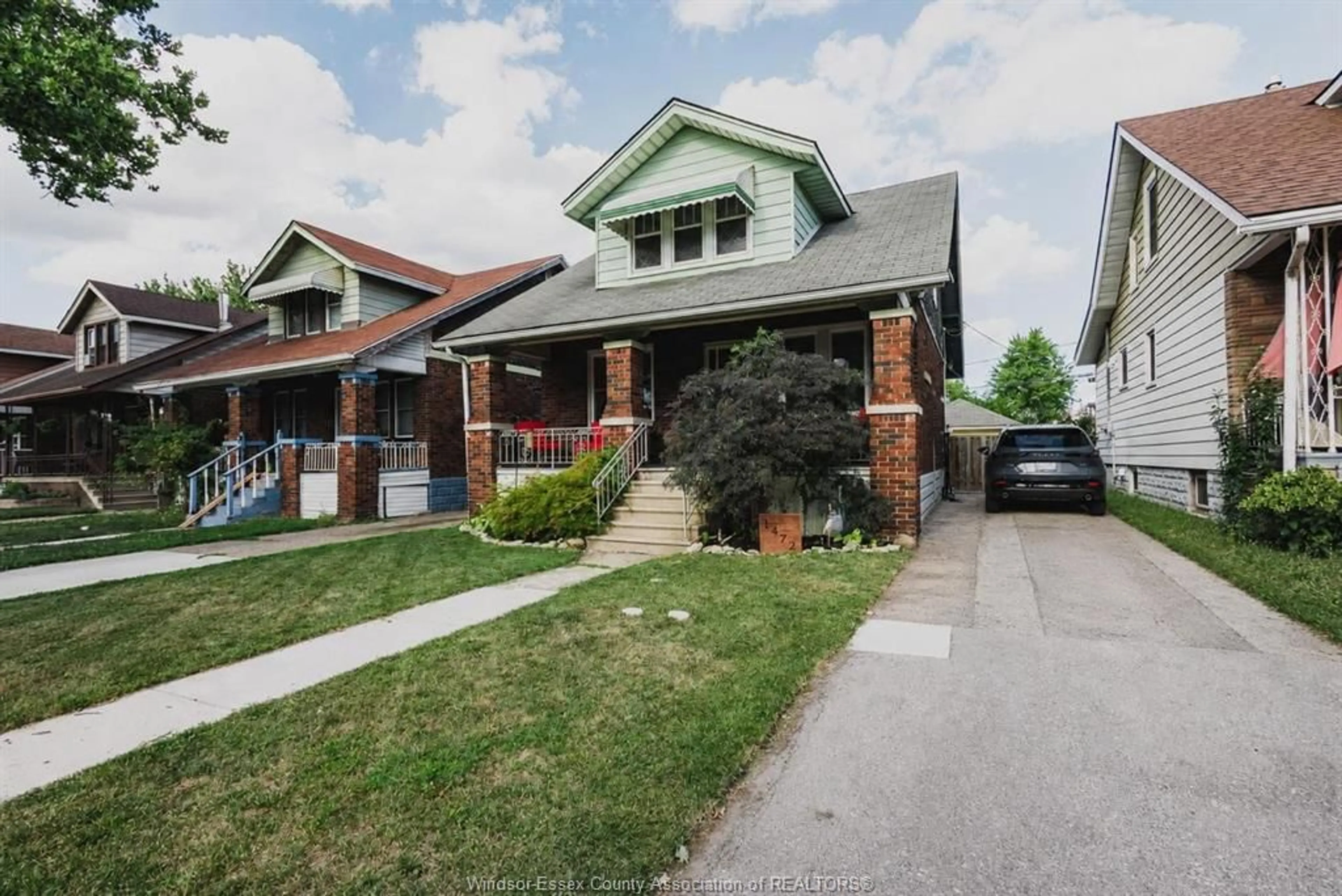 Home with brick exterior material, street for 1472 Albert Rd, Windsor Ontario N8Y 3P9