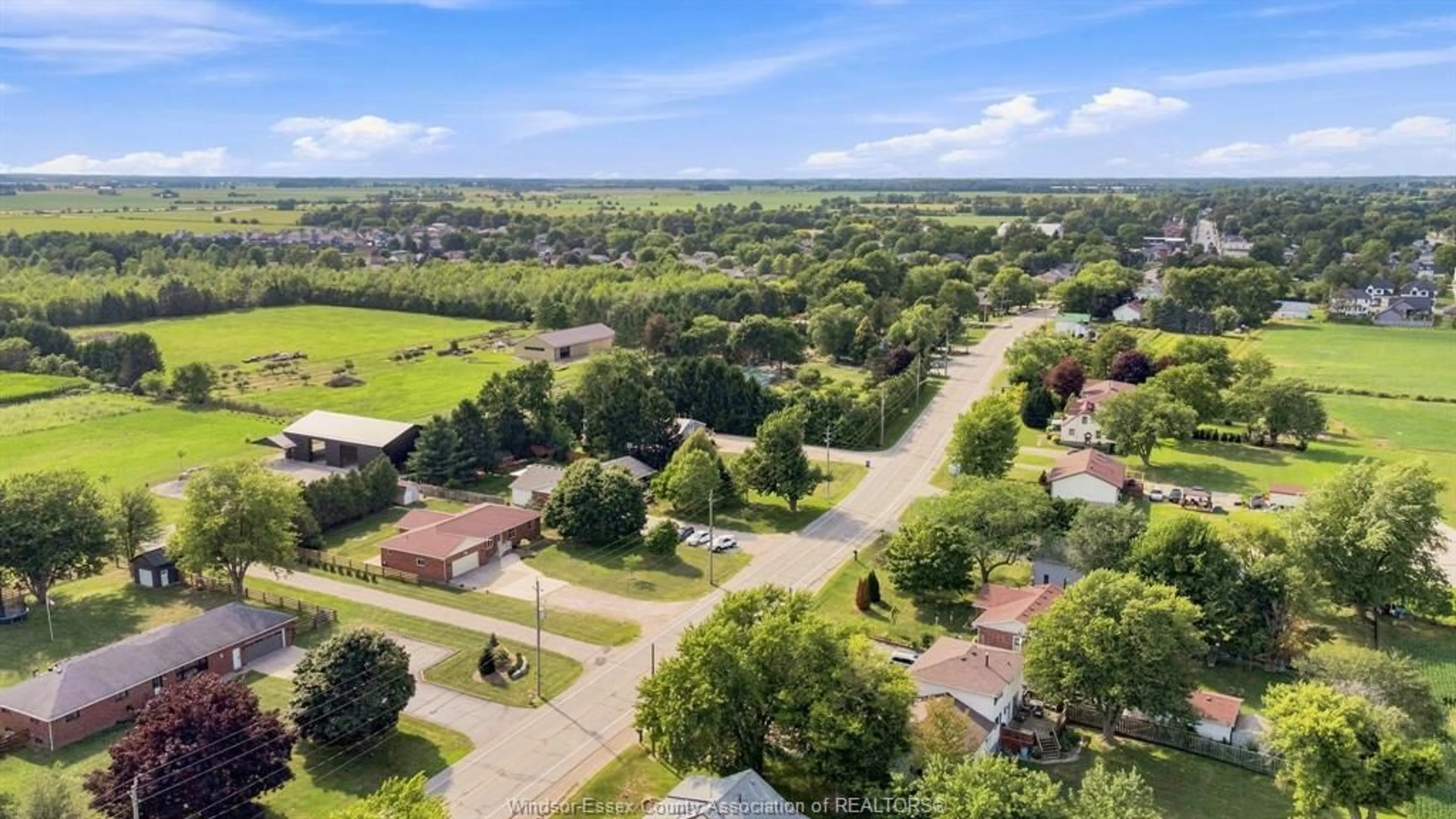 A pic from outside/outdoor area/front of a property/back of a property/a pic from drone, unknown for 164 COUNTY ROAD 34, Cottam Ontario N0R 1B0
