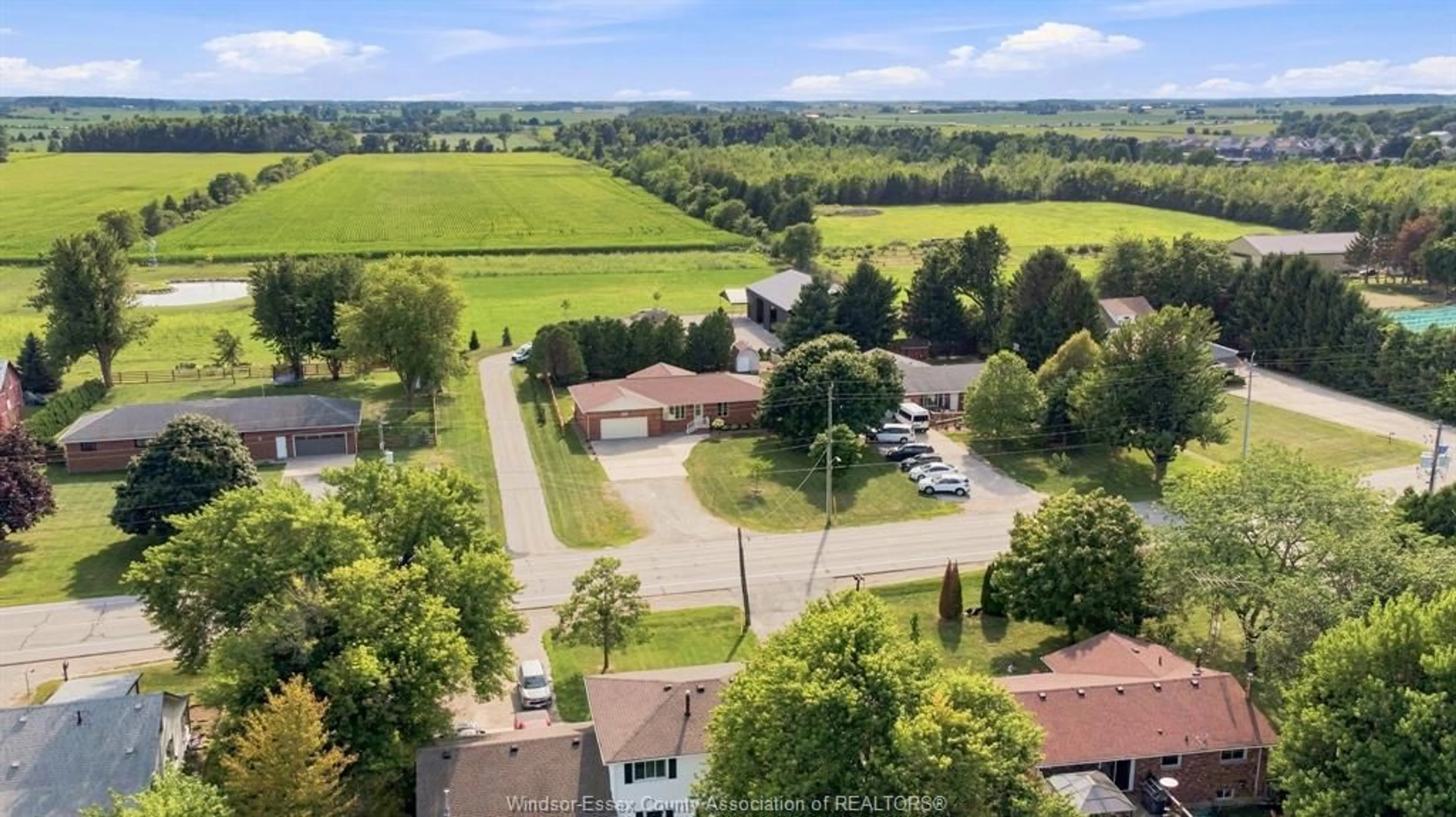 A pic from outside/outdoor area/front of a property/back of a property/a pic from drone, unknown for 164 COUNTY ROAD 34, Cottam Ontario N0R 1B0